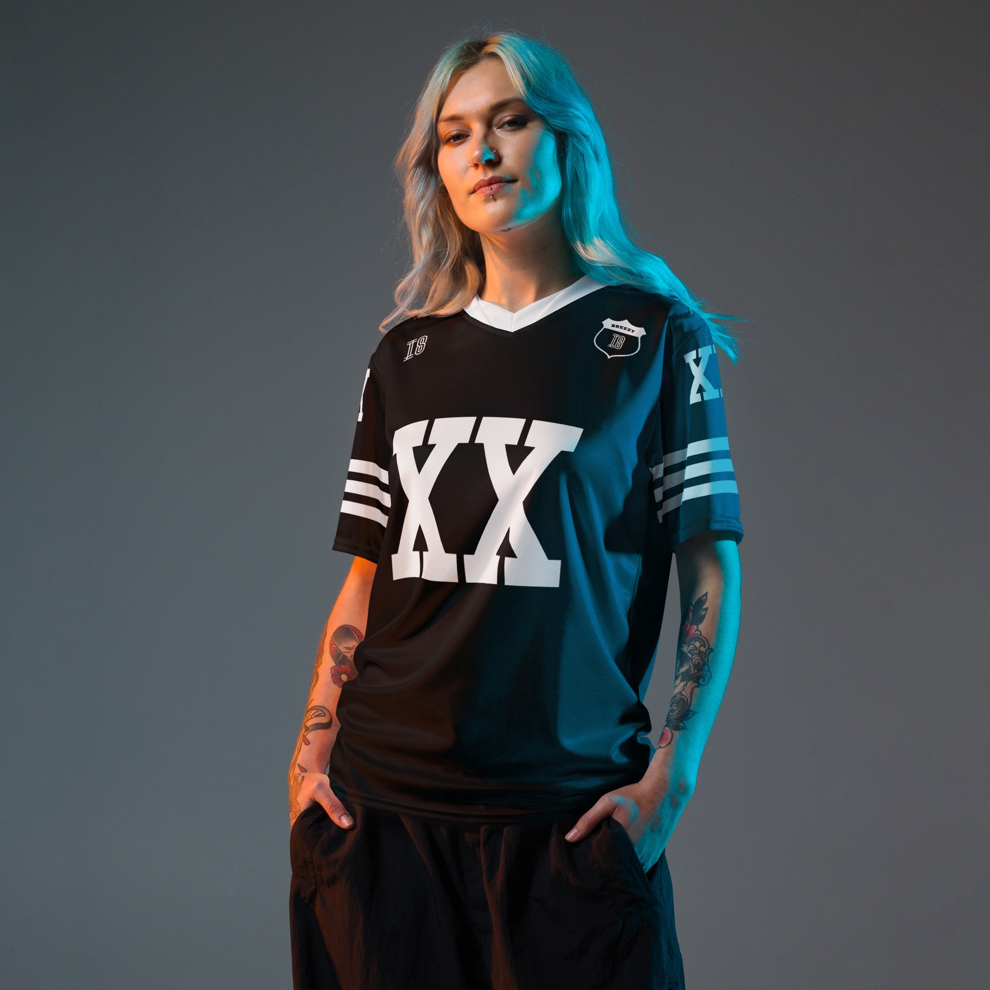 A Chris Brown black and white football jersey with XX and Breezy on the back and front in white.