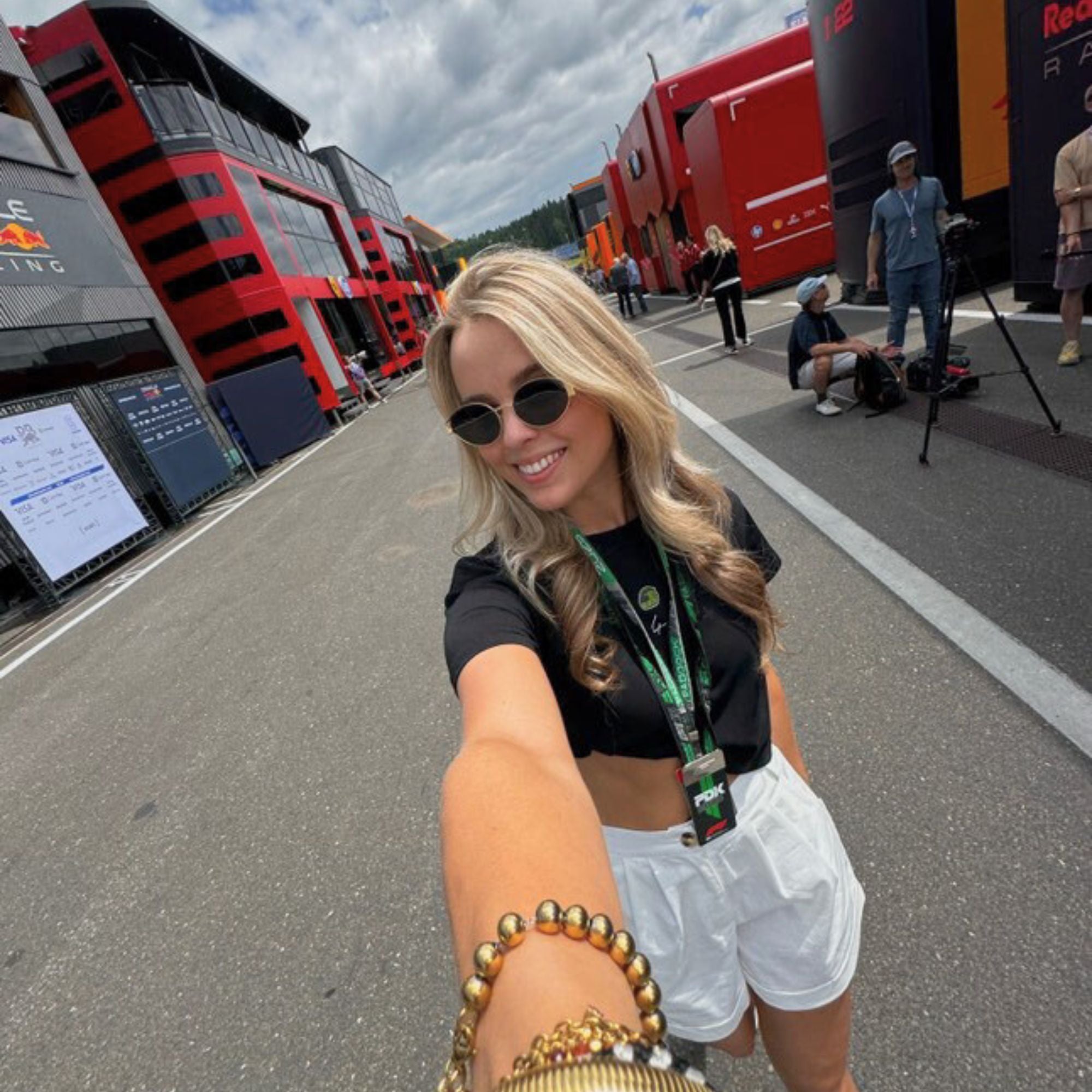 A black crop top with a carton image of Lando Norris's neon green and black helmut, with the number 4 in white below it.