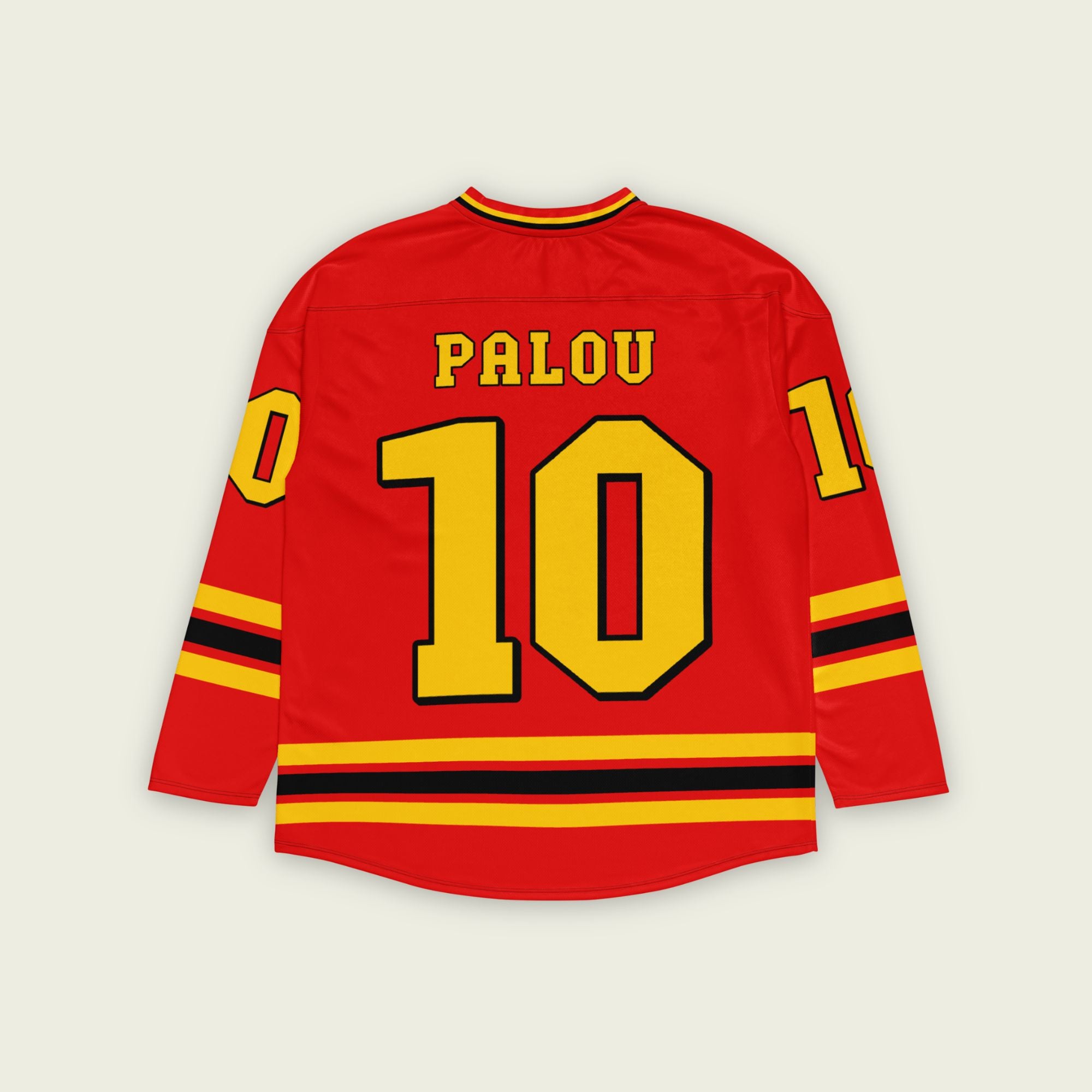 A red hockey jersey with Alex Palou's indycar racing number 10 on the front and back in yellow, also the name palou is on the back and front in yellow.