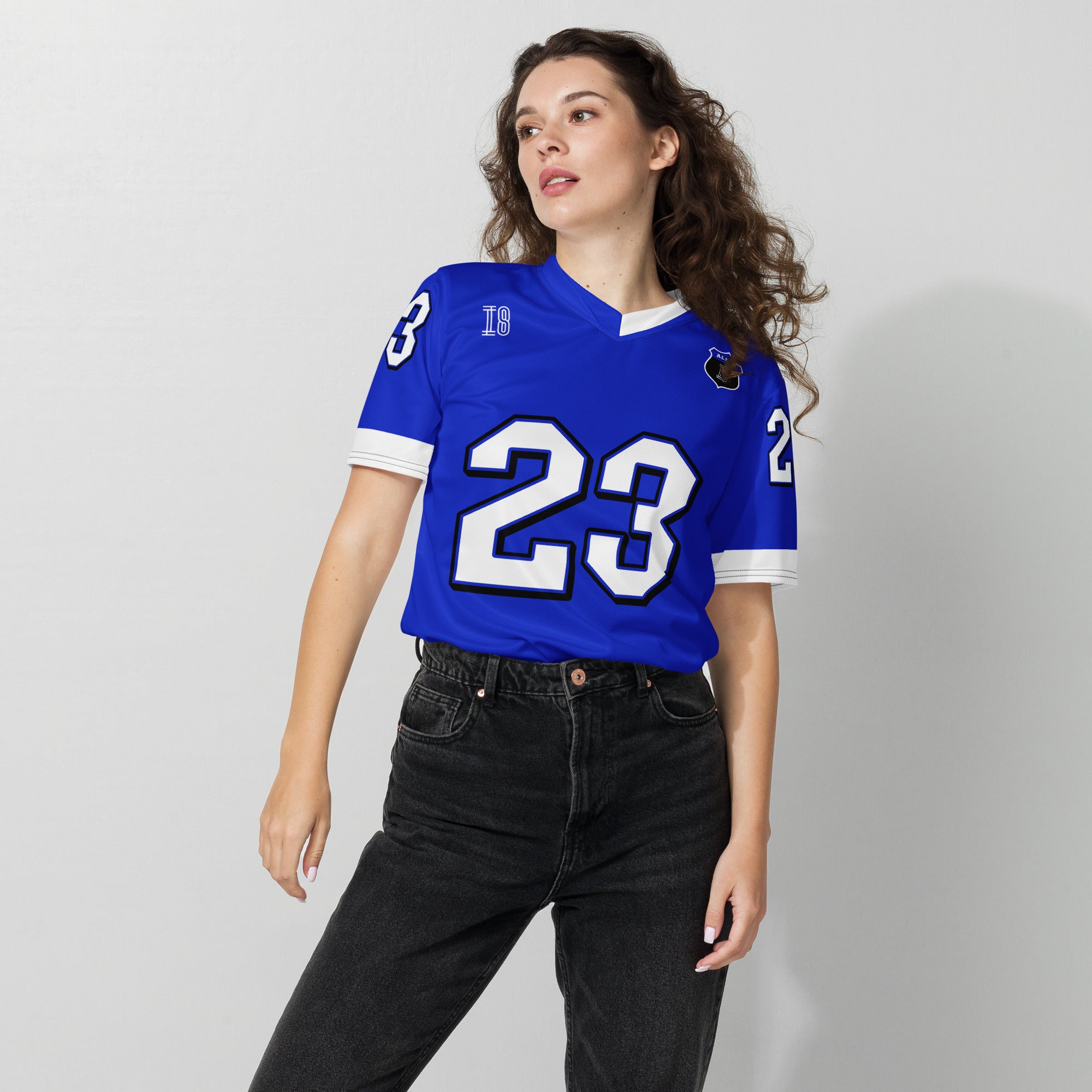 A blue and white football jersey with Alex Albon's Williams F1 racing number 23 on the back and front in white. It has the name Hamilton in red on the front and back as well.