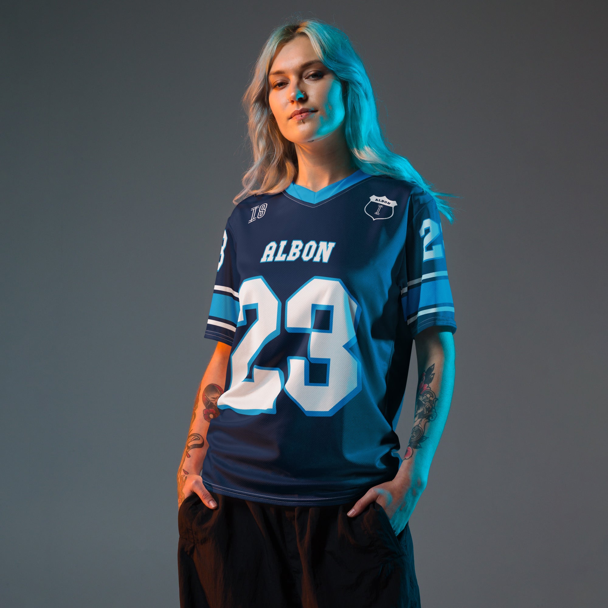 A navy blue football jersey with Alex Albons Williams F1 Racing number 23 on the front and back.