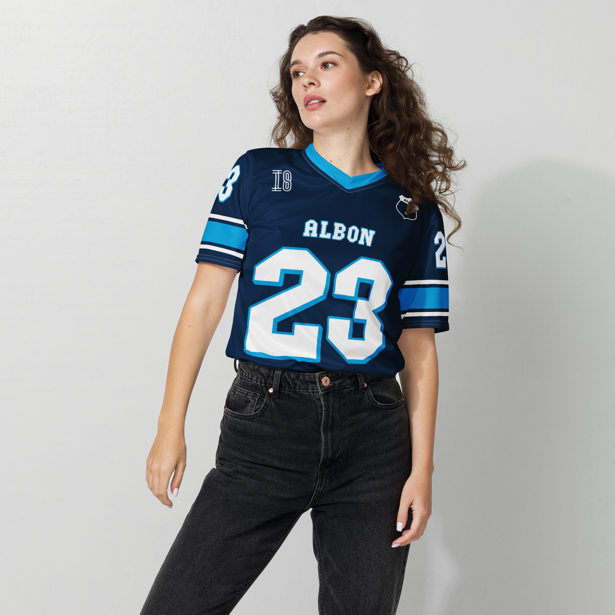 A navy blue football jersey with Alex Albons Williams F1 Racing number 23 on the front and back.