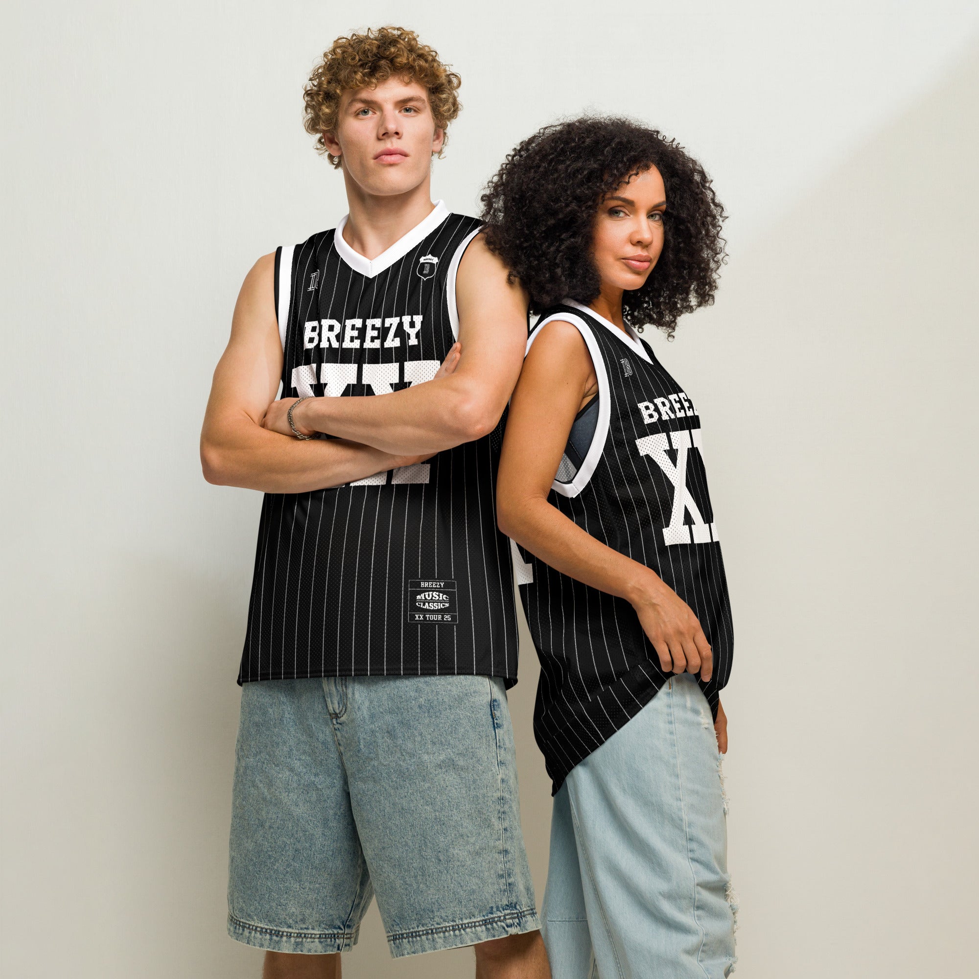 A black and white pin striped basketball Jersey with Chris Brown's Breezy name on the front and back and XX for his 11-11 tour in white, both on the front and back.