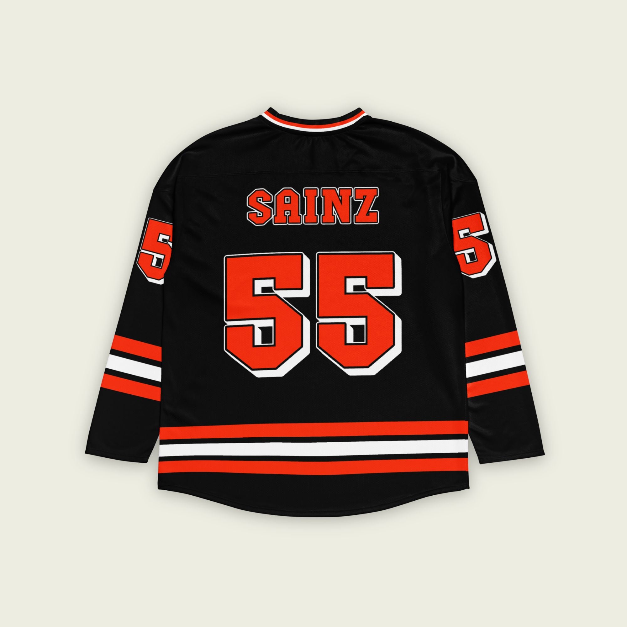 A black, red, and white F1 hockey Jersey with Carlos Sainz's name and number printed on the back and front