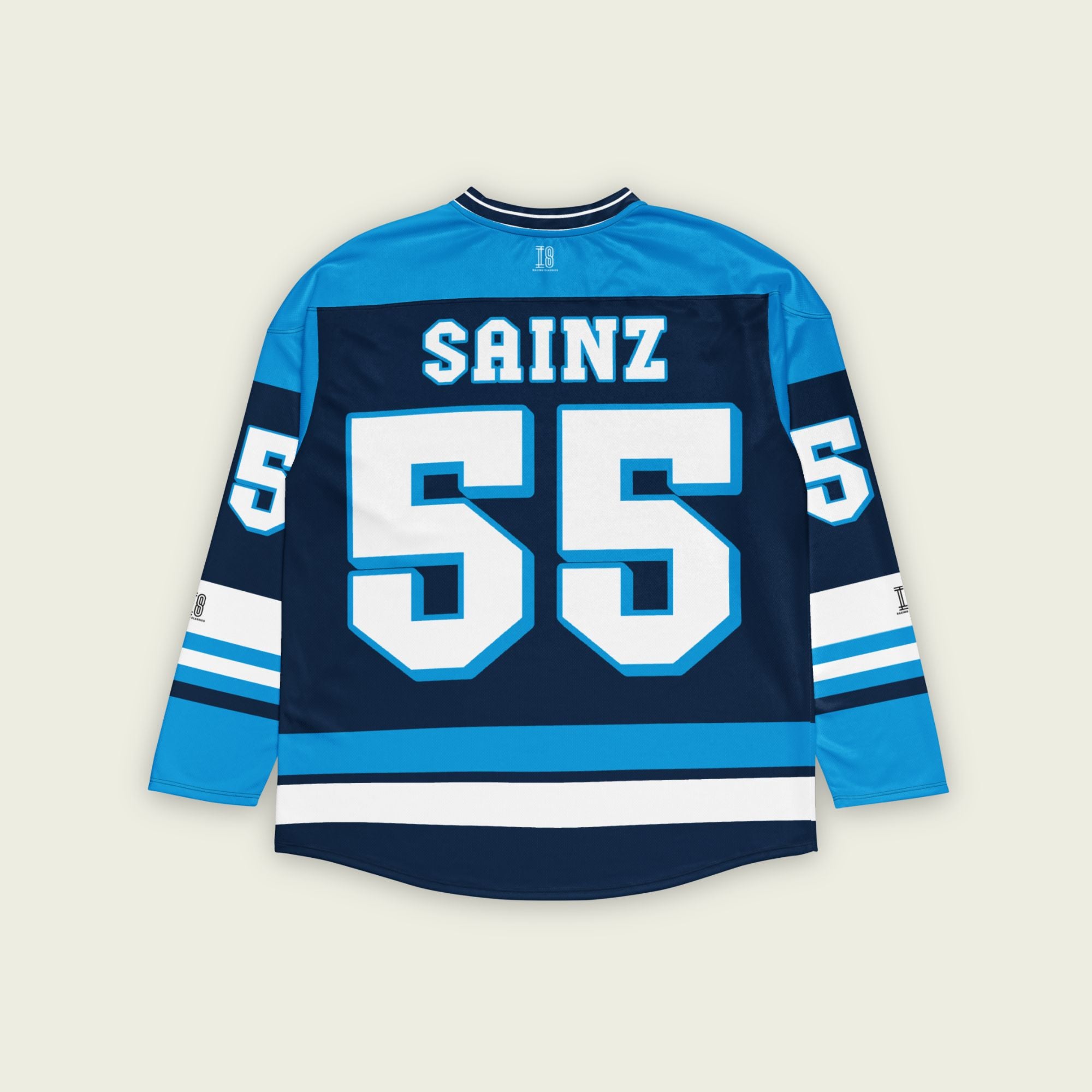 A blue hockey jersey with Carlos Sainz's Williams F1 Racing number 55 in white on the front and back. It also has the name Sainz on the back and front in white.