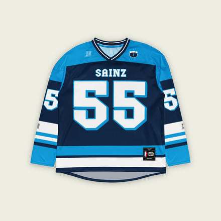 A blue hockey jersey with Carlos Sainz's Williams F1 Racing number 55 in white on the front and back. It also has the name Sainz on the back and front in white.