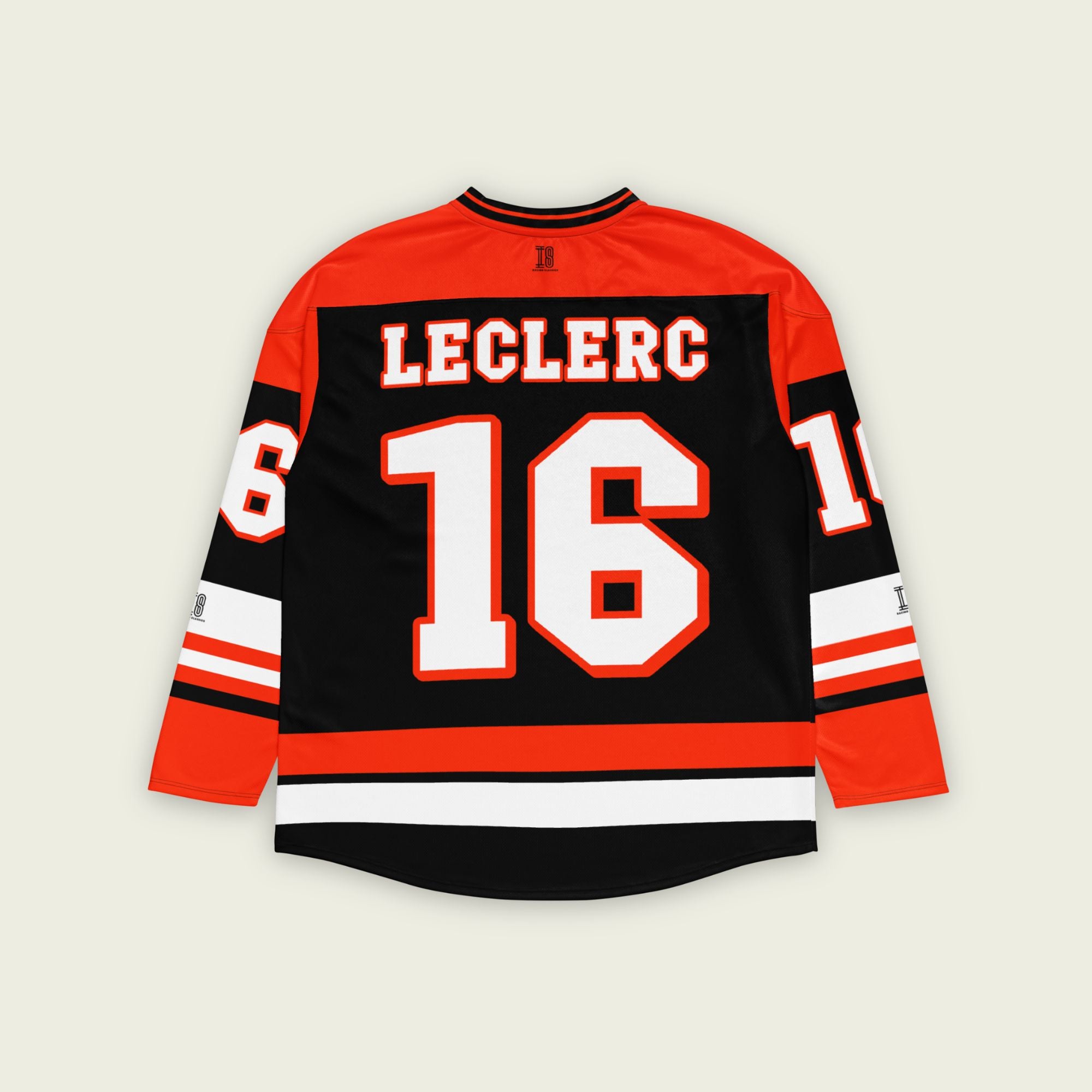 A red and black hockey jersey with Charles Leclerc's Ferrari F1 racing number 16 in white on the front and back. It has the name Leclerc on the back and front in white as well.
