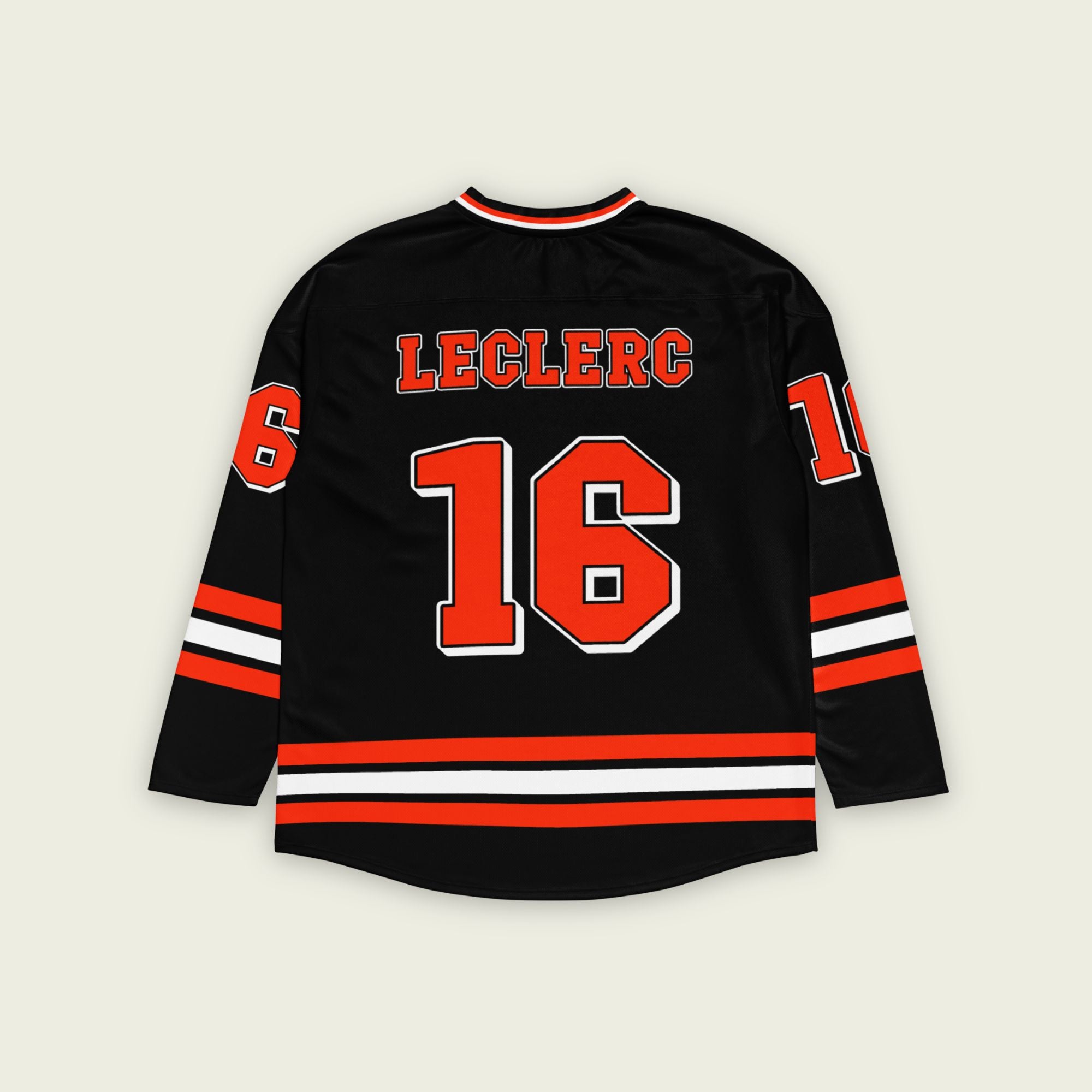 A black hockey jersey with red and white stripes on the bottom and the arms. It has Charles Leclerc's Ferrari F1 racing number 16 on the front and the back with the name Leclerc just above each number