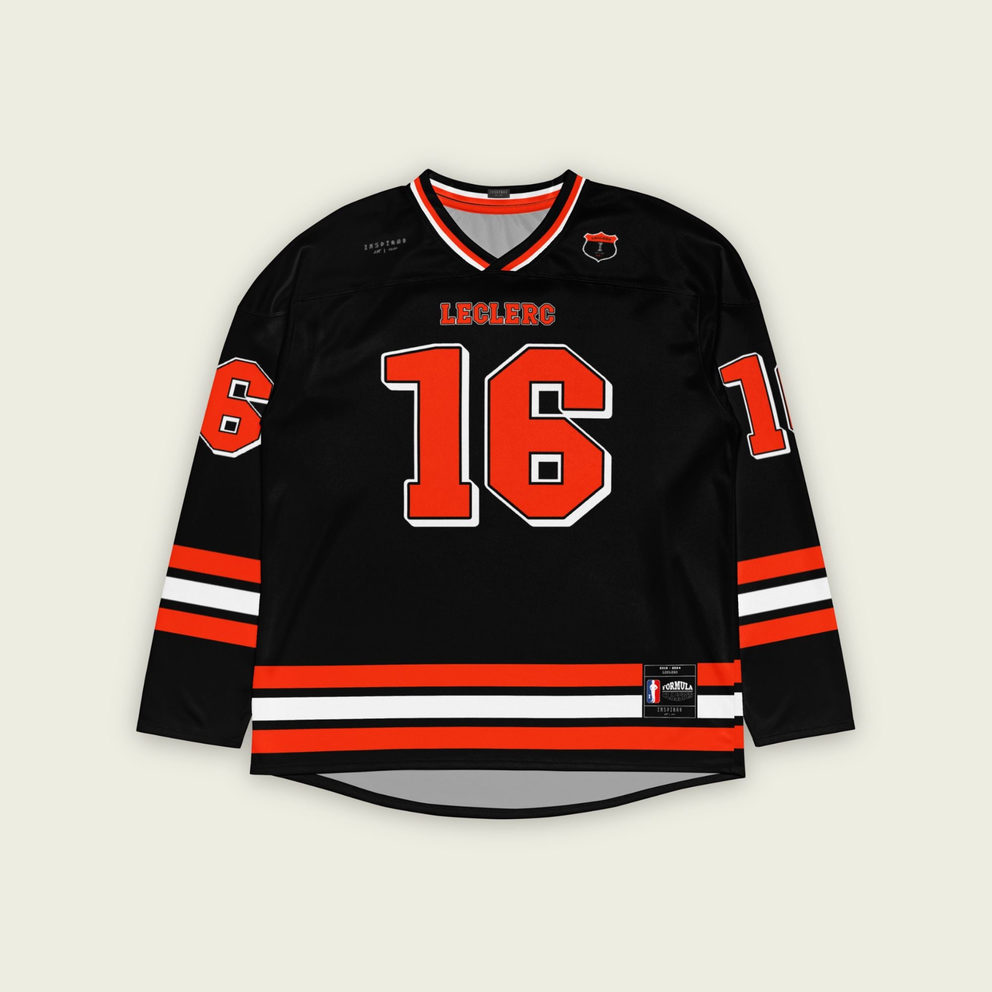 A black hockey jersey with red and white stripes on the bottom and the arms. It has Charles Leclerc's Ferrari F1 racing number 16 on the front and the back with the name Leclerc just above each number