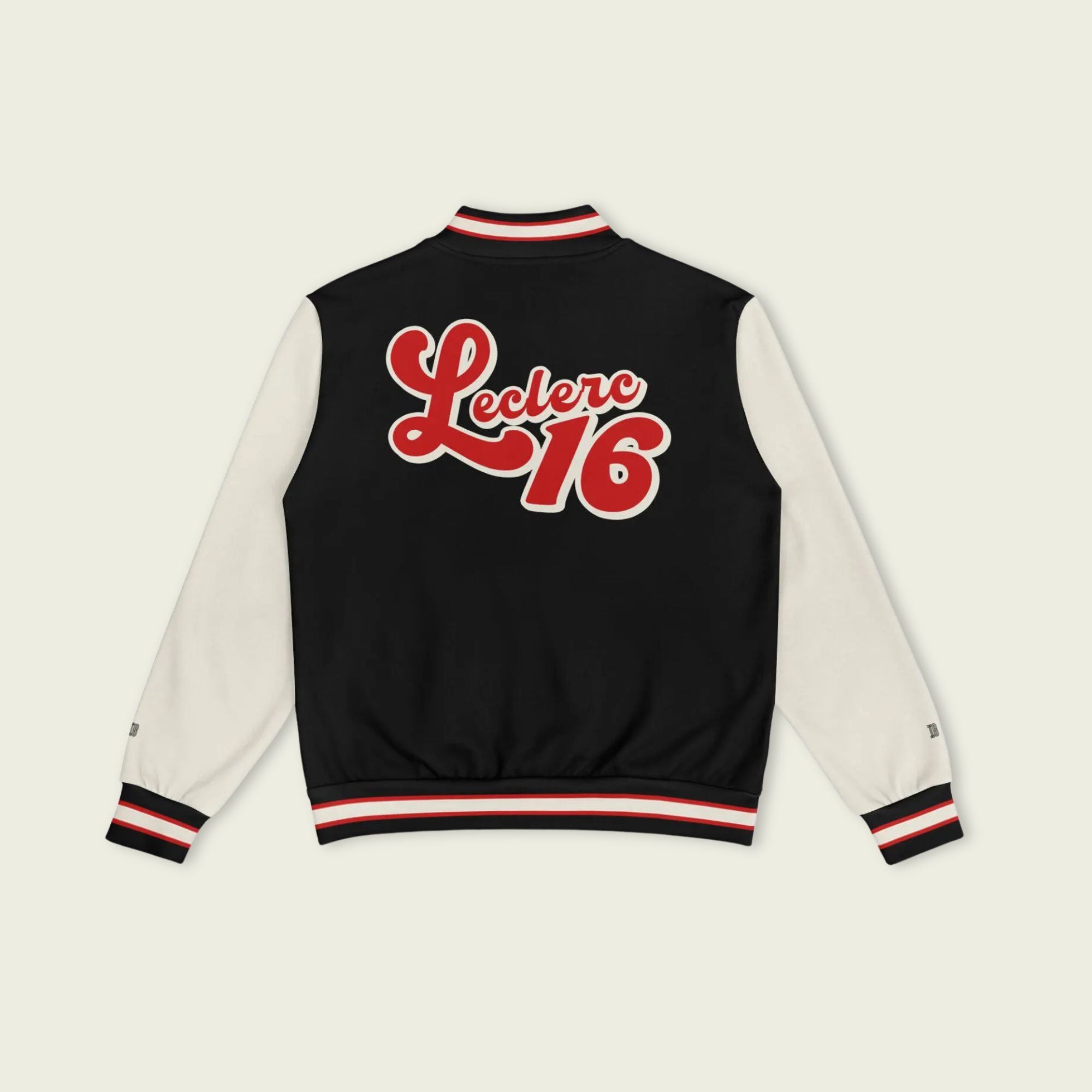 A black, red, and tan, varsity jacket with Charles Leclerc's Ferrari F1 racing number 16 in red on the front and back.