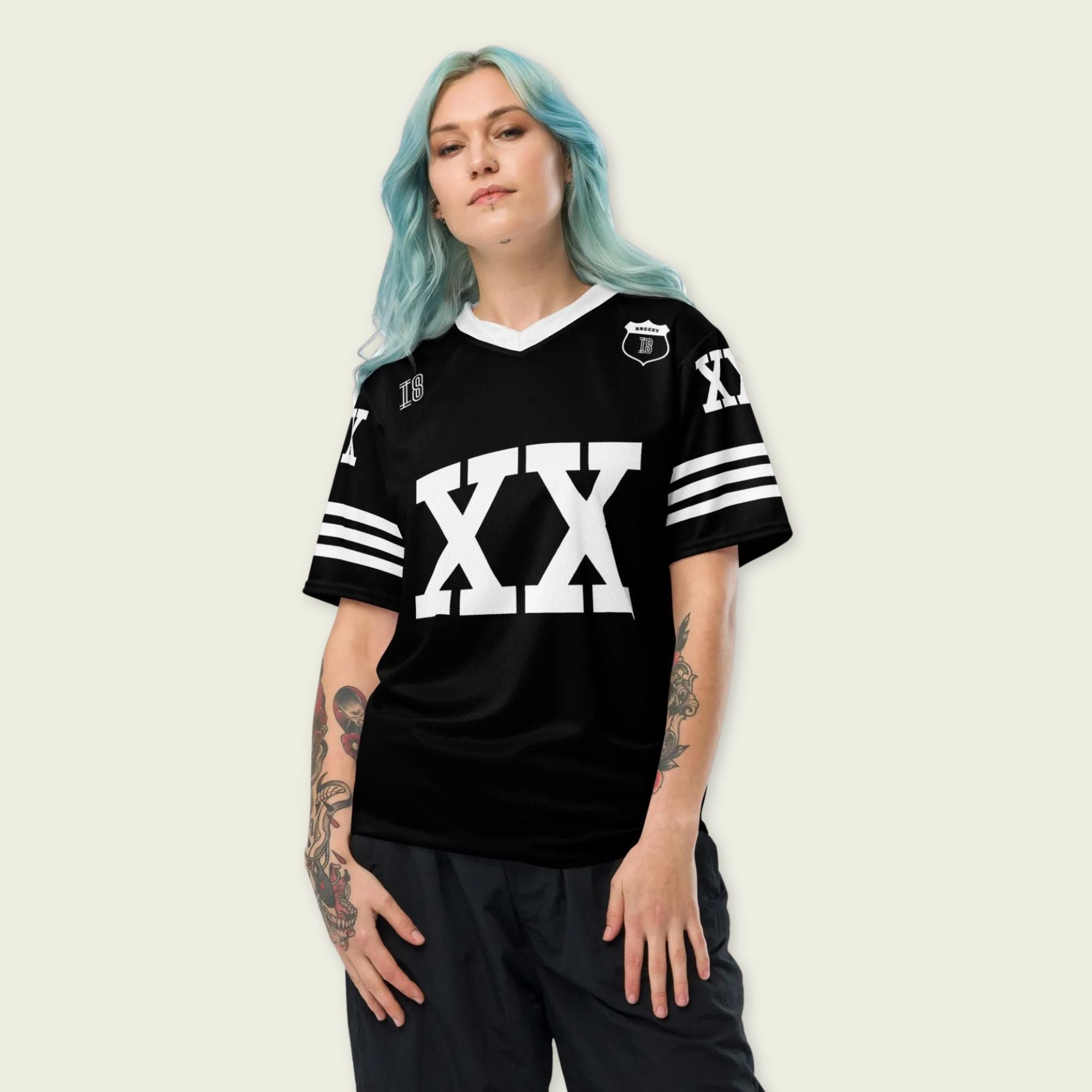 A Chris Brown black and white football jersey with XX and Breezy on the back and front in white.
