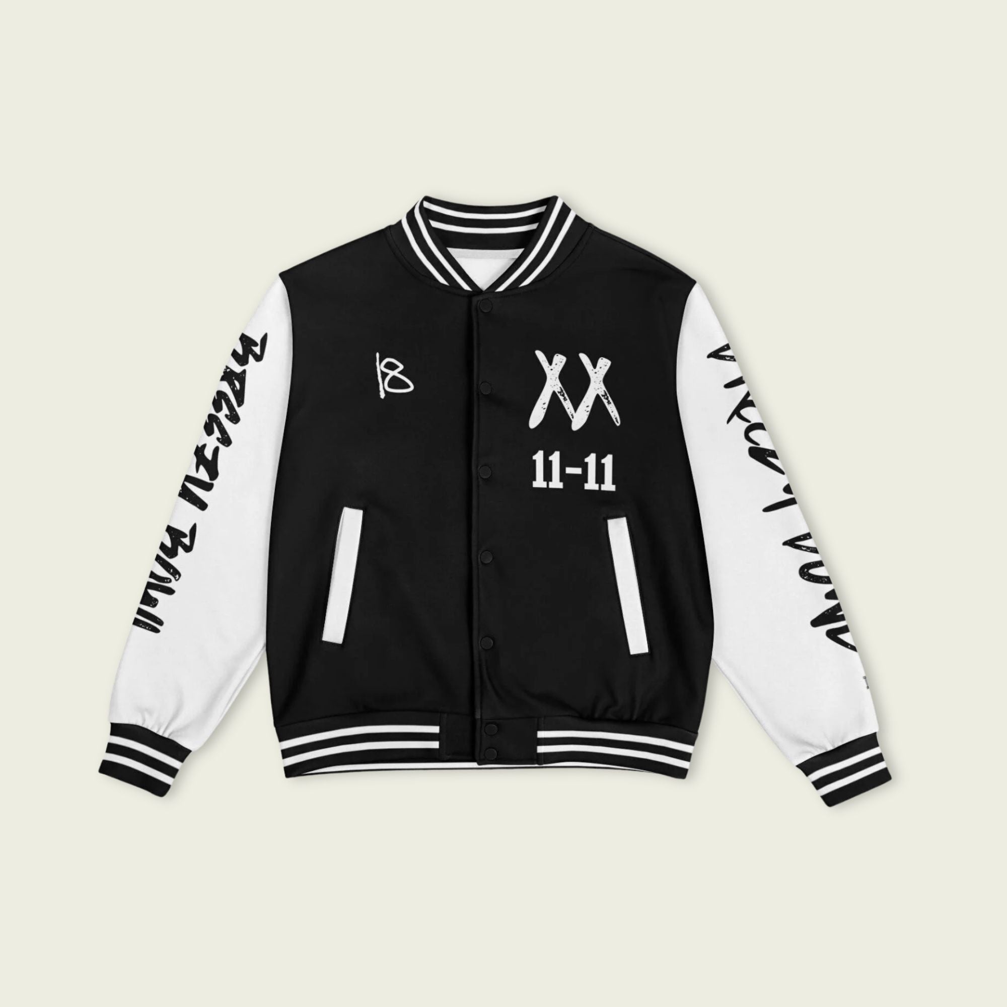 A black and white varsity jacket showing Chris Browns name Breezy on the back with XX and 11-11 breezy bowl tour