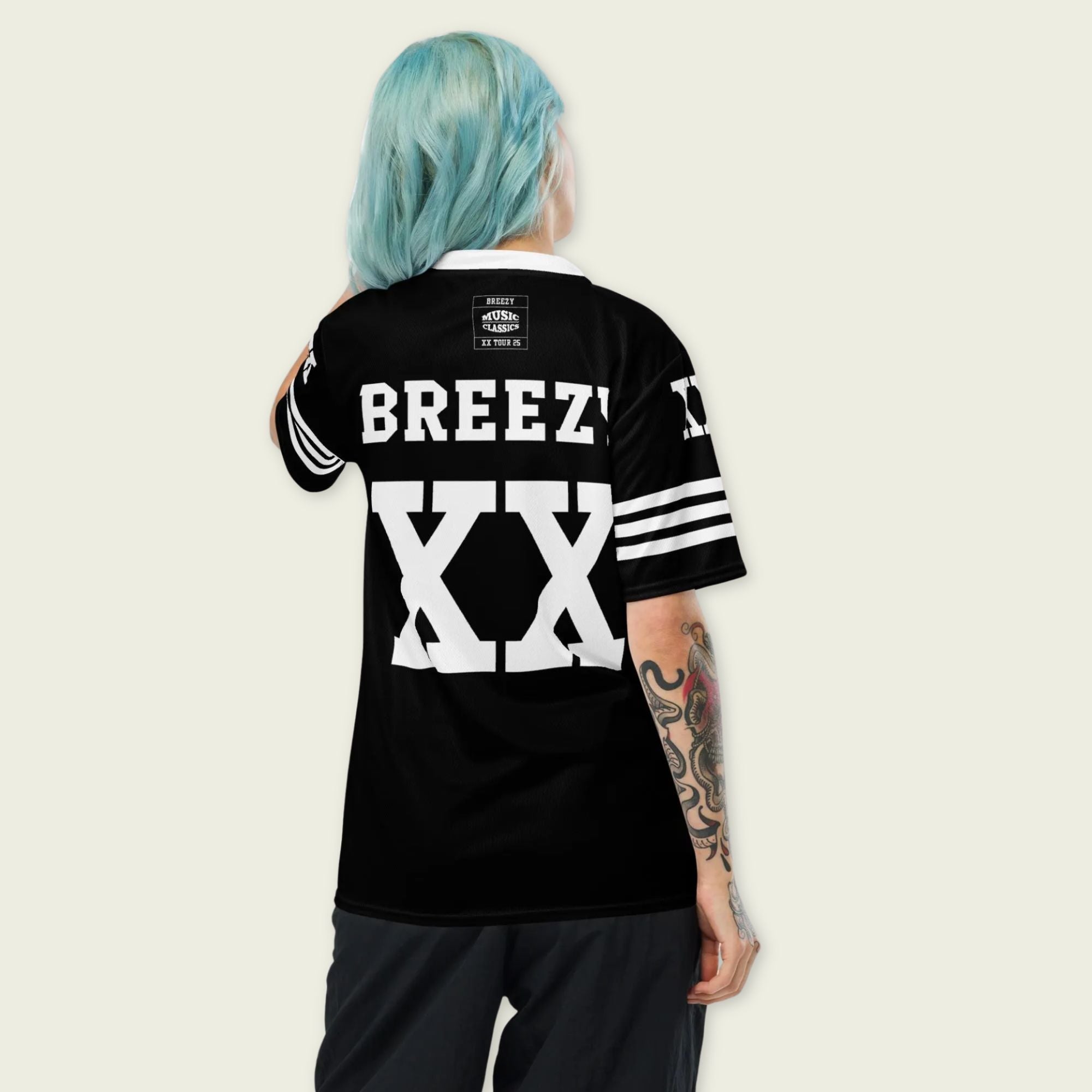 A Chris Brown black and white football jersey with XX and Breezy on the back and front in white.