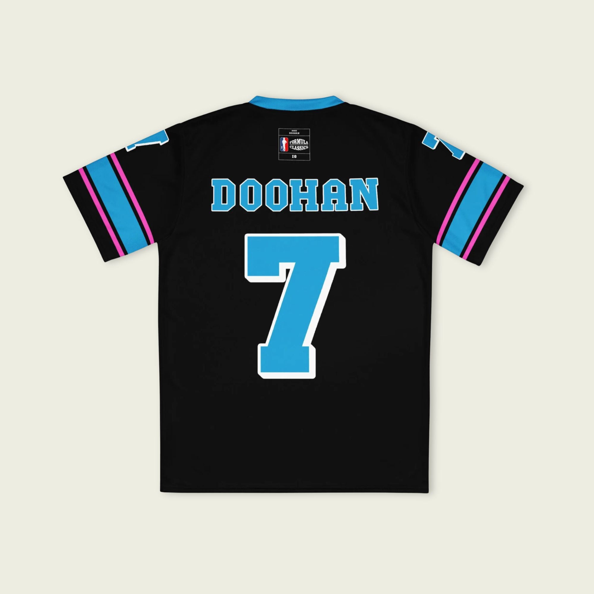 A navy blue football jersey with Jack Doohan's Alpine F1 Racing number 7 on the front and back.
