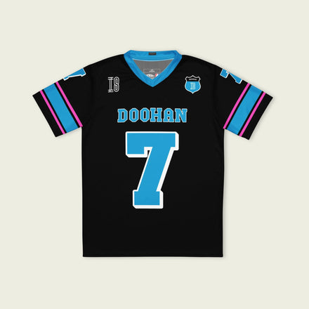 A navy blue football jersey with Jack Doohan's Alpine F1 Racing number 7 on the front and back.