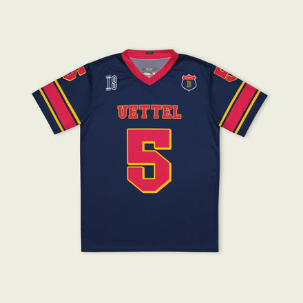 A navy blue football jersey with sebastian vetel redbull  F1 Racing number 5 on the front and back.
