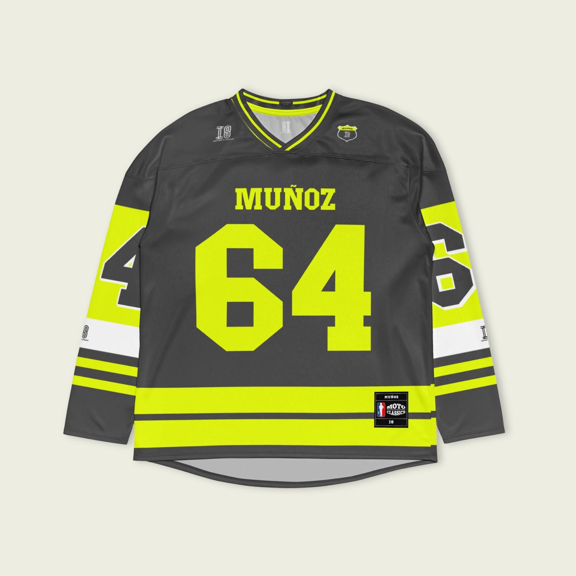 A Grey and highlight yellow hockey jersey with Daivd Munuzs name and moto gp racing number 64 on the front and back in yellow.