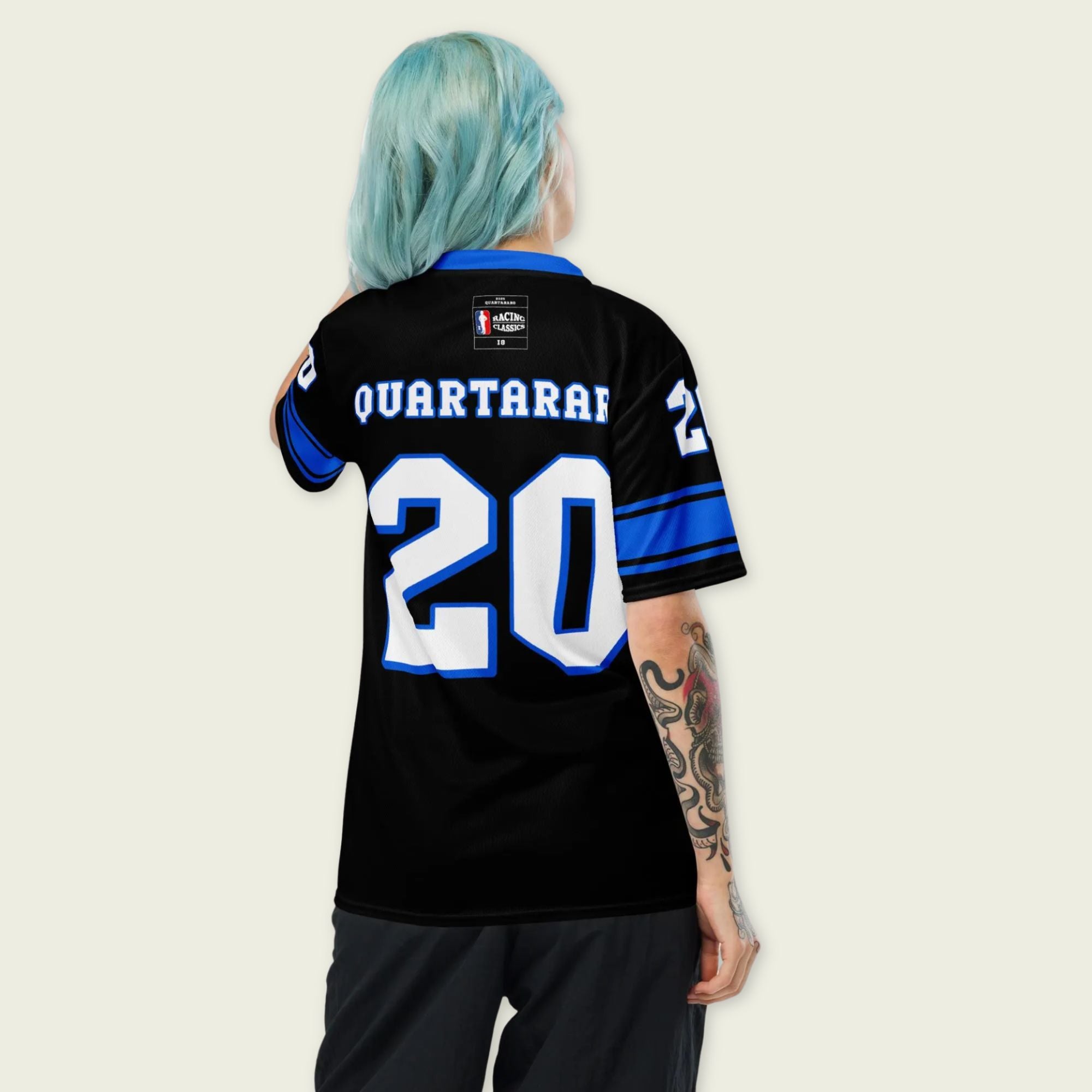 A black and blue football jersey with Fabio Quartararo Moto GP racing number 20 in white with a blue outline.