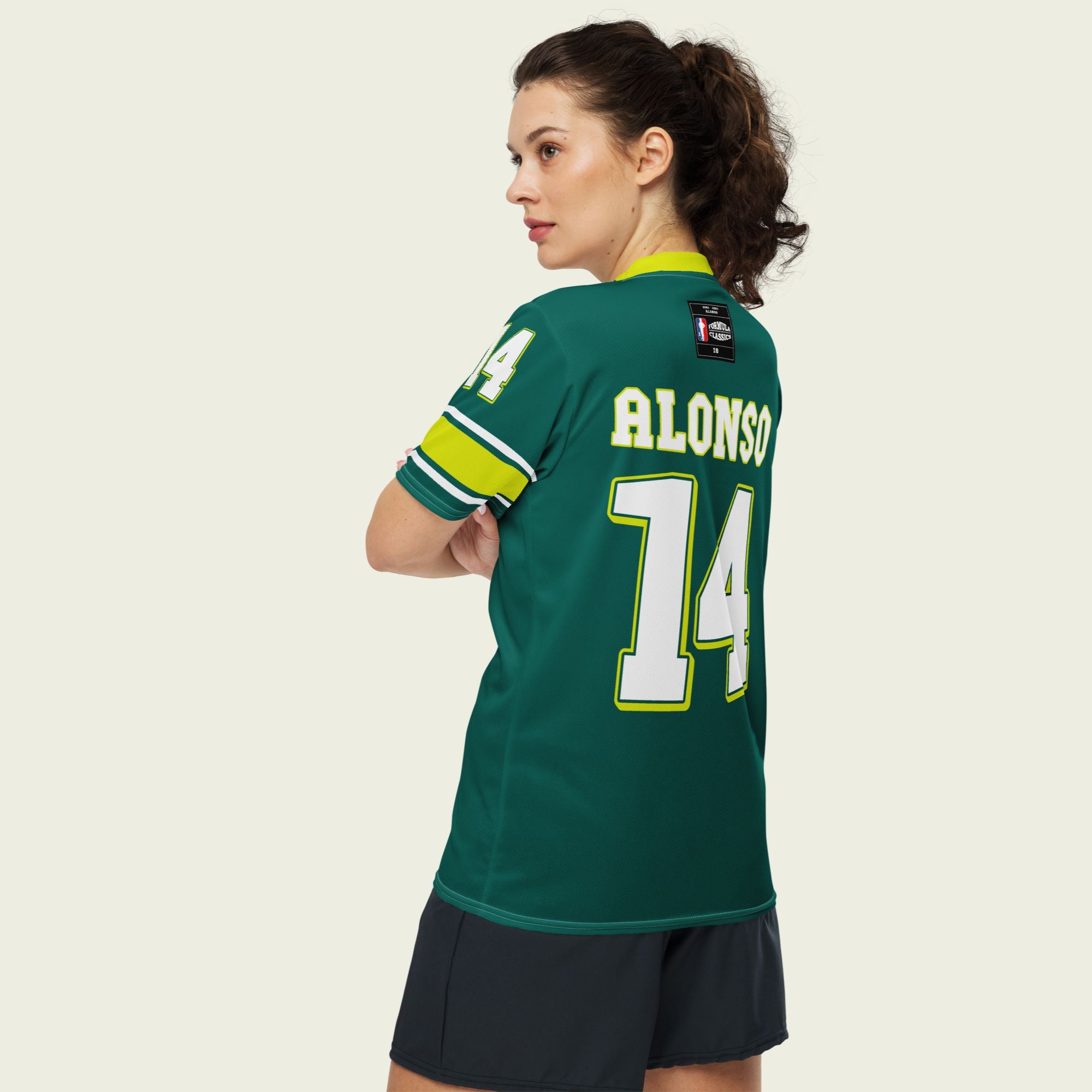 A dark green and highlight yellow football jersey with Fernando Alonso's Aston Martin F1 racing numer 14 on the front and back in white.