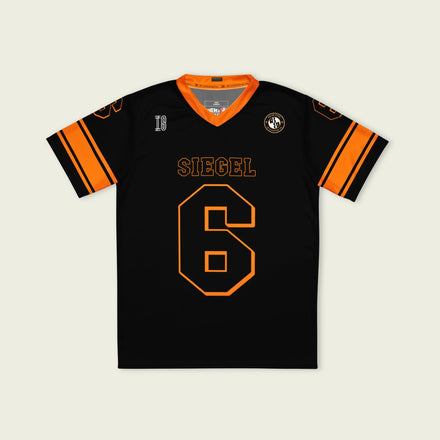 Black sports jersey with orange accents and 'SIEGEL' and number '6' on a beige background