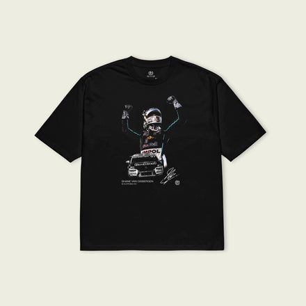 Black t-shirt with graphic design on a beige background