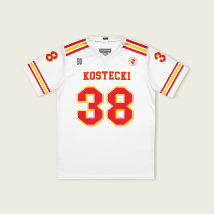 White sports jersey with red and yellow accents featuring the name 'Kostecki' and number '38'.