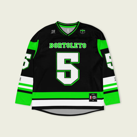 A green and black hockey jersey with Gabriel Bortoleto's Kick Stake F1 racing number 5 in green on the front and back. It has the name Gabriel Bortoleto on the back and front in green as well.