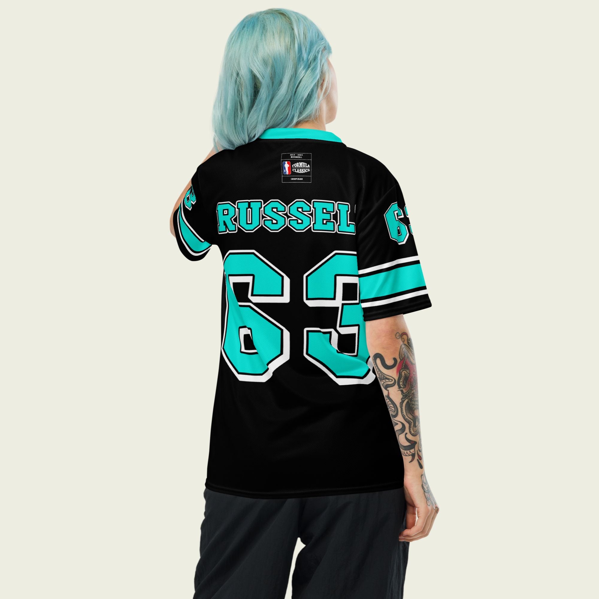 A black and highlight green football jersey with George Russell's Mercedes F1 racing number 63 on the front and back. The name Russell is on the front and back.