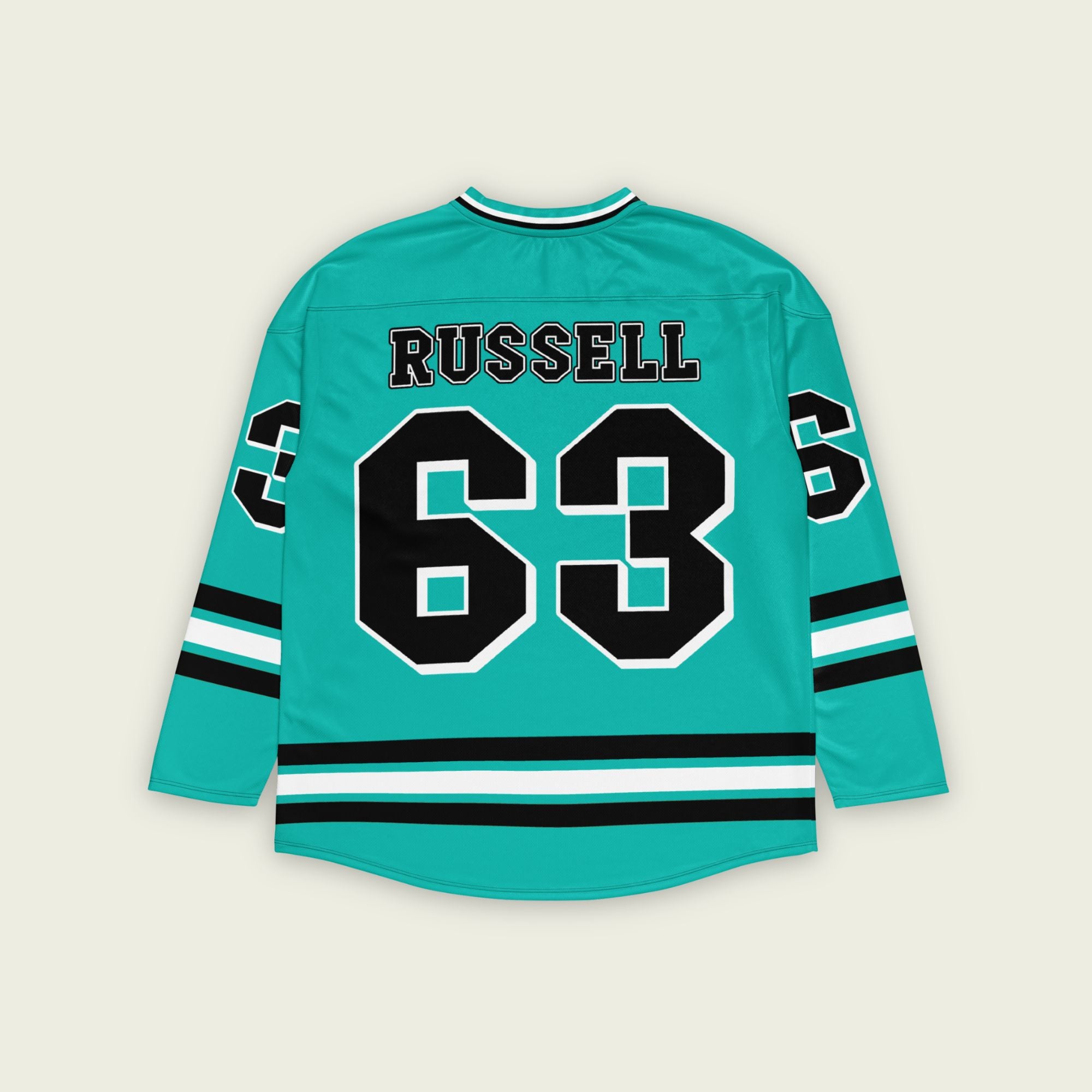A green hockey jersey with three stipes on the bottom the middle one is white and the bottom and top are black. It has the number 63 that George Russell races with in F1 that is filled with black and a white outline, it is displayed on the back and front. Also there is text on the front and back "Russell"