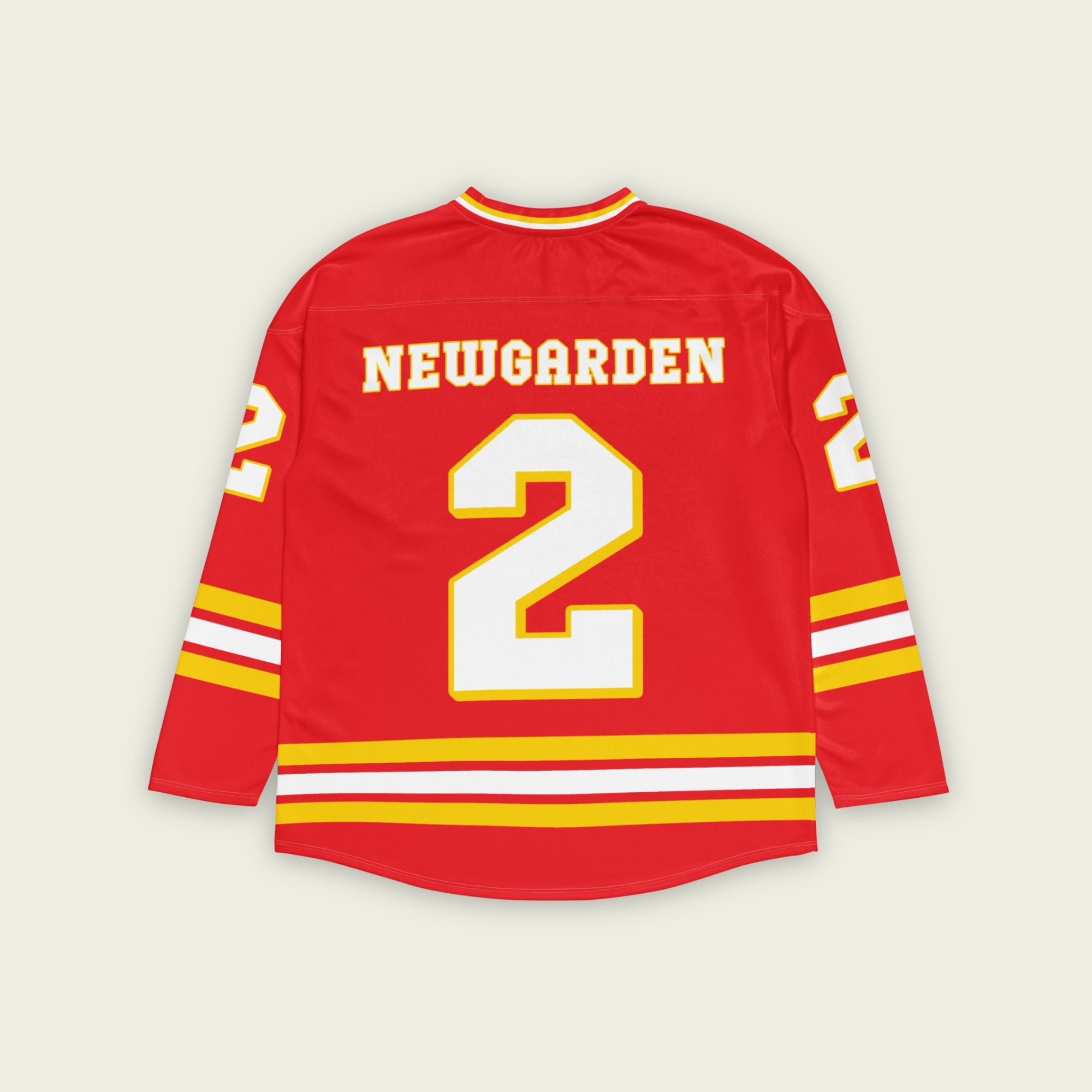 A red hockey jersey with yellow and white stripes. It has Newgarden's indycar racing number 2 and the name newgarden on the front and back in white with a yellow outline.