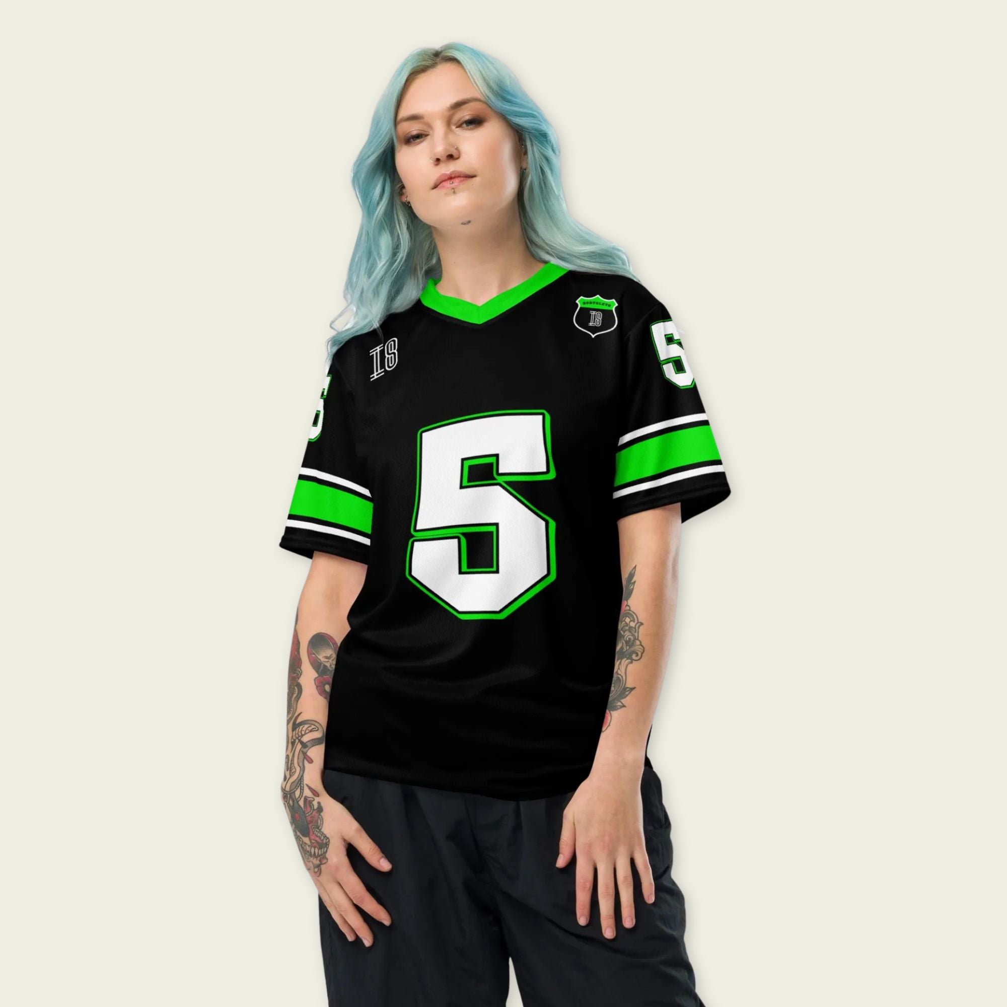 A black and highlight green football jersey with Gabriel Bortoleto's Kick Stake F1 racing number 5 on the front and back in green.