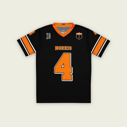 A black and Papaya orange football jersey with Lando Norris's McLaren F1 racing number 4 on the back and front in orange. It has the name Norris in papaya on the front and back as well.