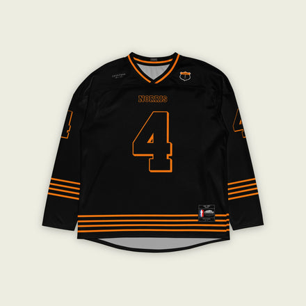 A black and papaya orange hockey jersey with orange stripes at the bottom, and Lando Norris's F1 racing number 4 on the front and back.