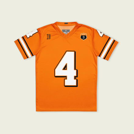 A papaya orange football jersey with Lando Norris's McLaren F1 Racing number 4 on the front and back.