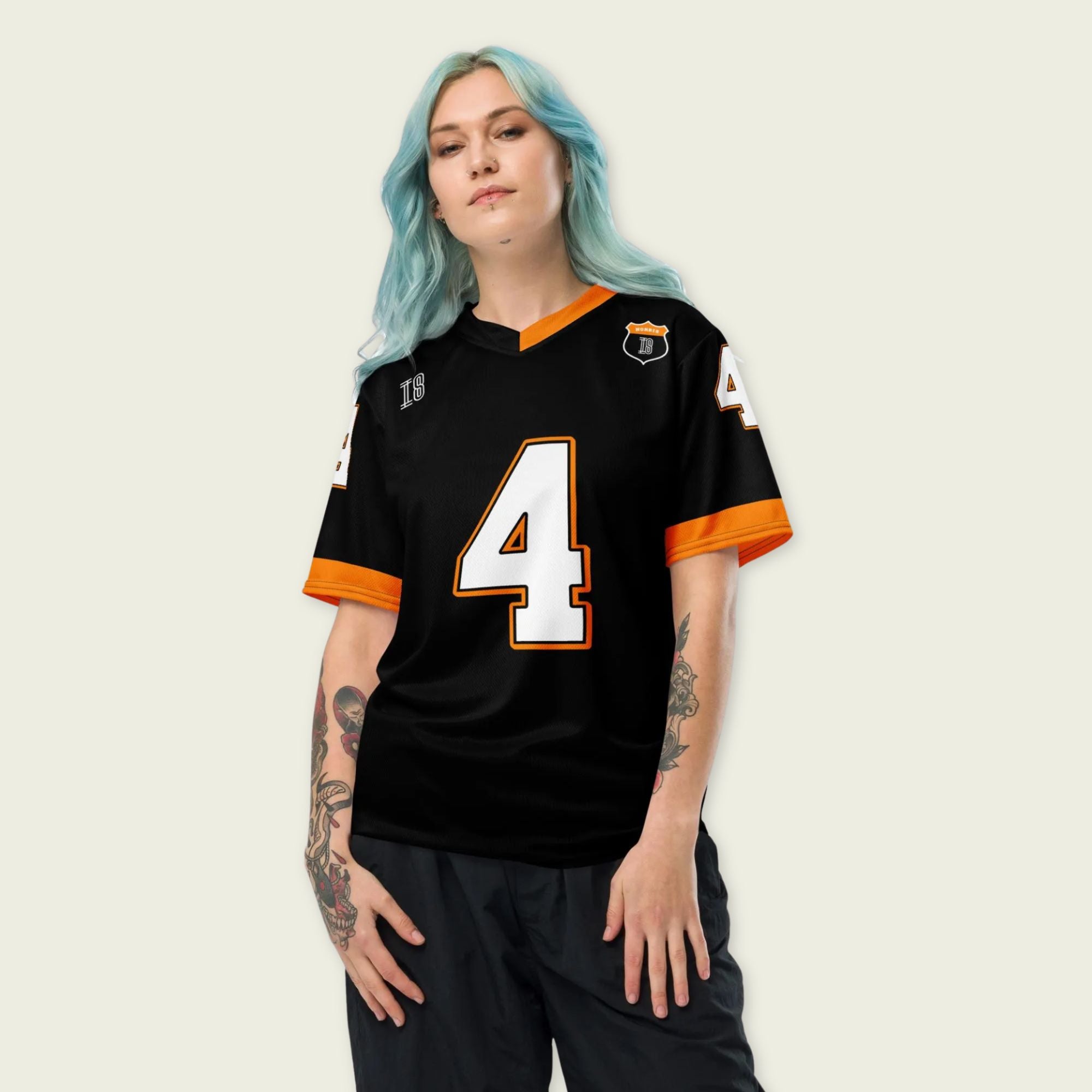 A black and papaya orange football jersey with Lando Norris's McLaren F1 racing number 4 on the back and front in white. It has the name Norris in orange on the front as well.