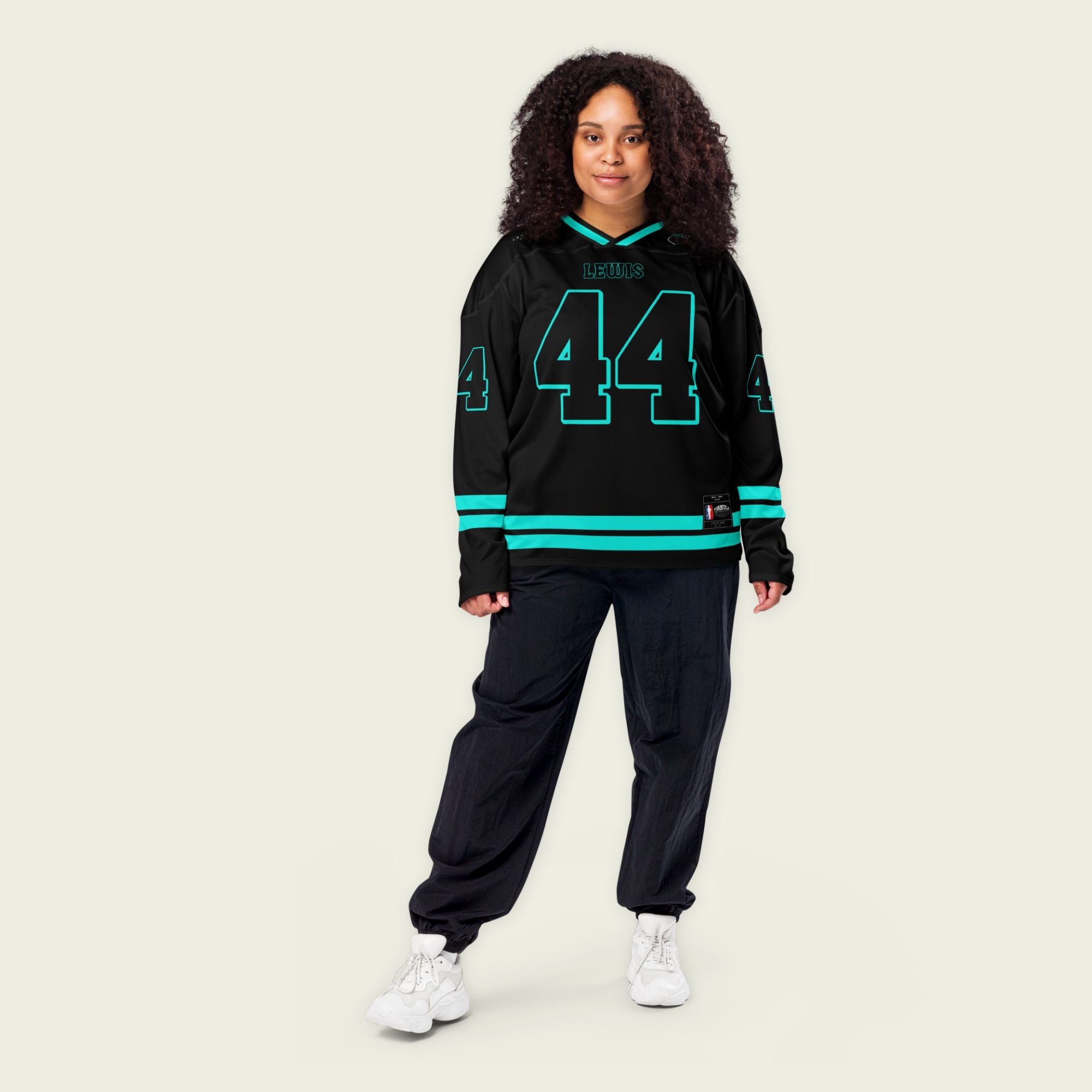 A black Lewis Hamilton hockey Jersey with his f1 racing number 44 in mercedes amg green color.