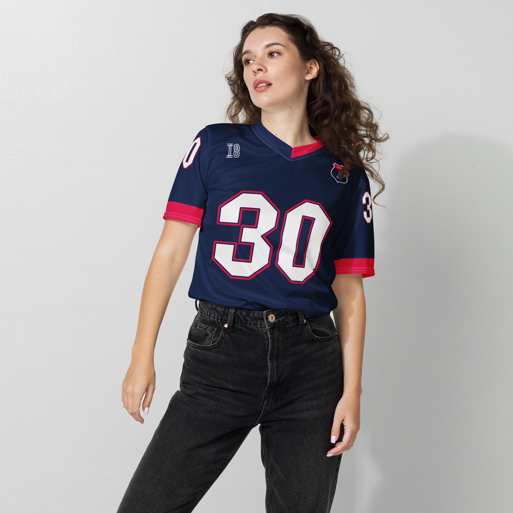 A navy blue and red football jersey with Liam Lawson's Redbull  F1 racing number 30 on the back and front in white. It has the name Lawson in white on the front and back as well.