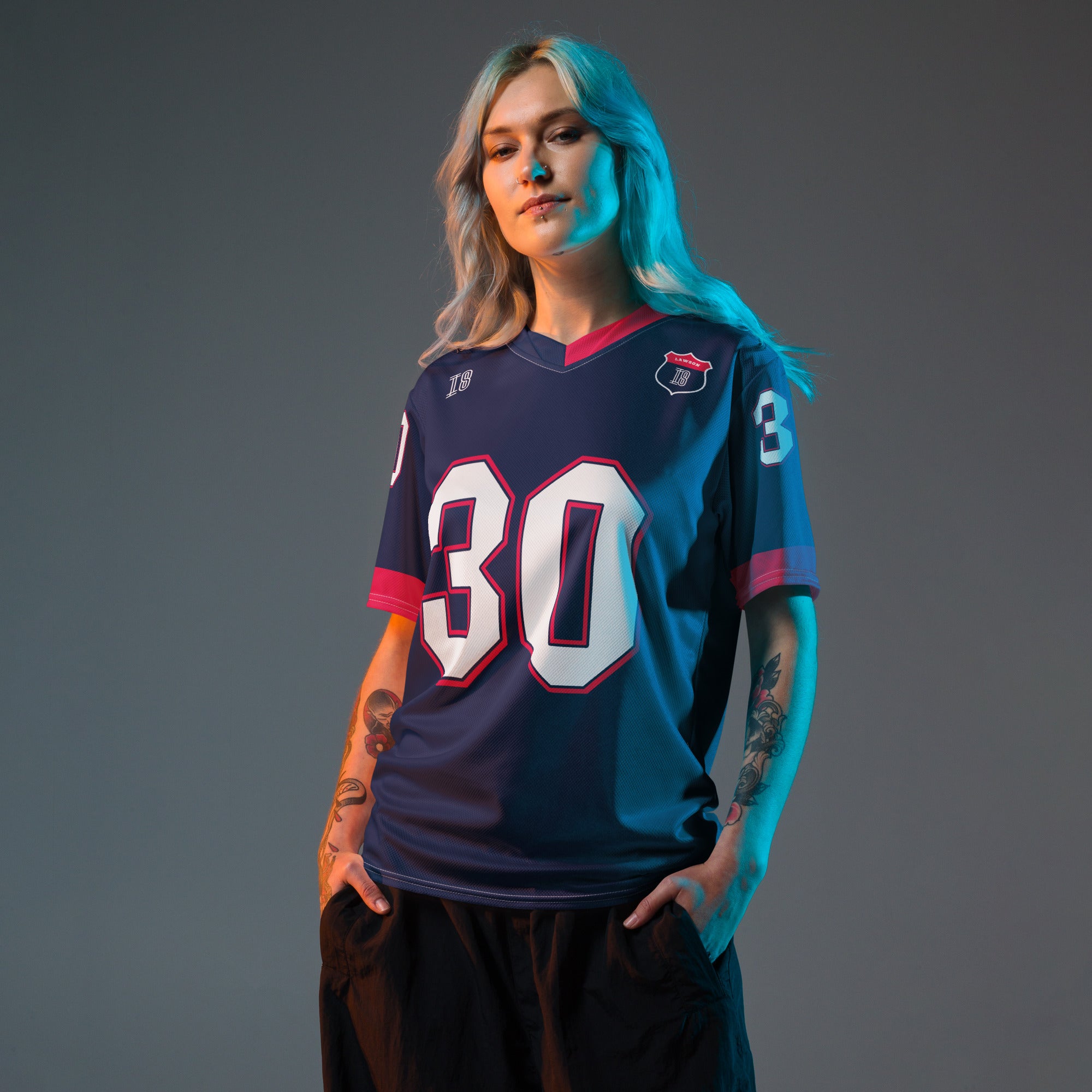 A navy blue and red football jersey with Liam Lawson's Redbull  F1 racing number 30 on the back and front in white. It has the name Lawson in white on the front and back as well.