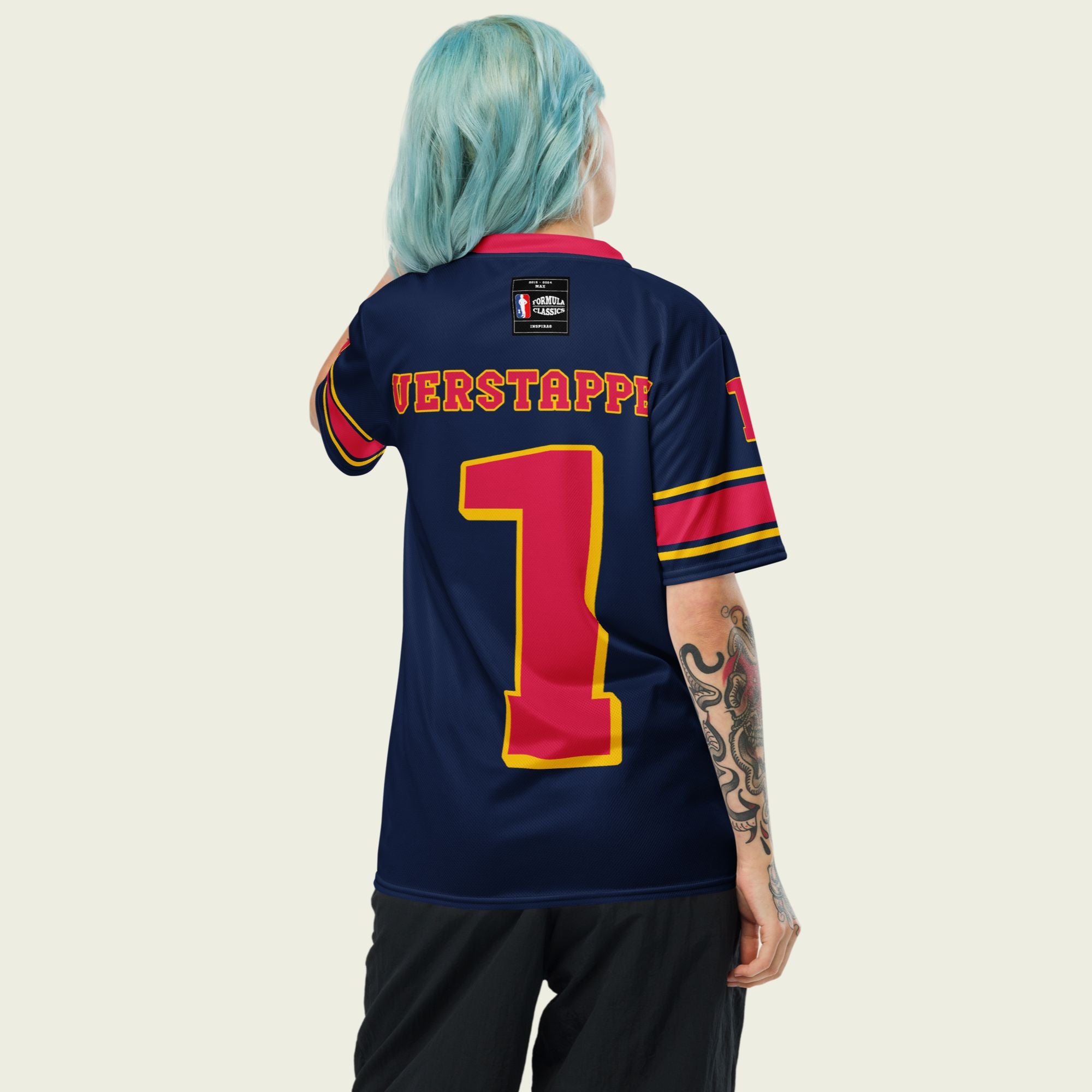 A navy blue and red football jersey with  Max Verstappen's Redbull F1 racing number 1 on the front and back.