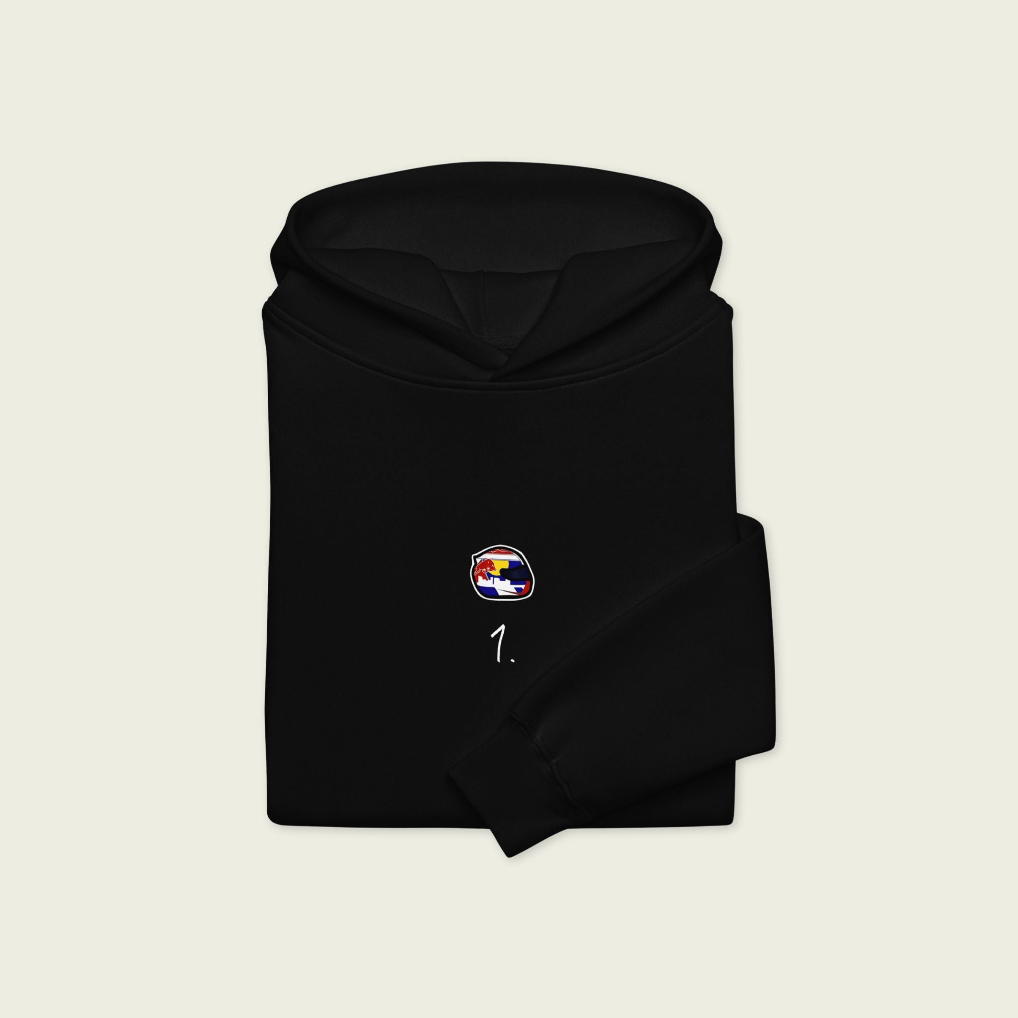 A black oversized hoodie with white text Max Verstappen's racing number 1 on the front and Verstappen's graphic helmut on the front.