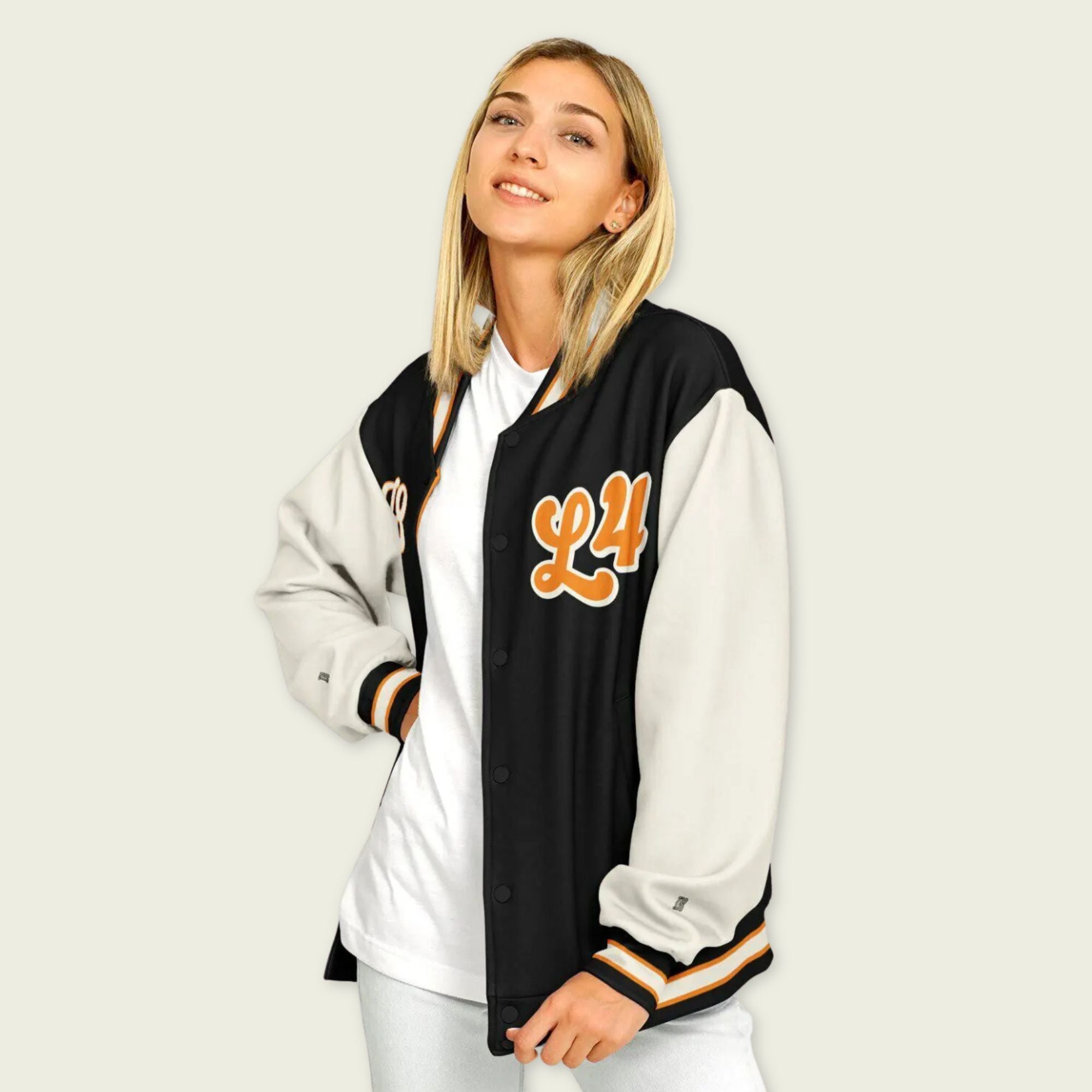 A black, papaya orange, and tan, varsity jacket with Oscar Piastri's McLaren F1 racing number 81 in orange on the front and back.
