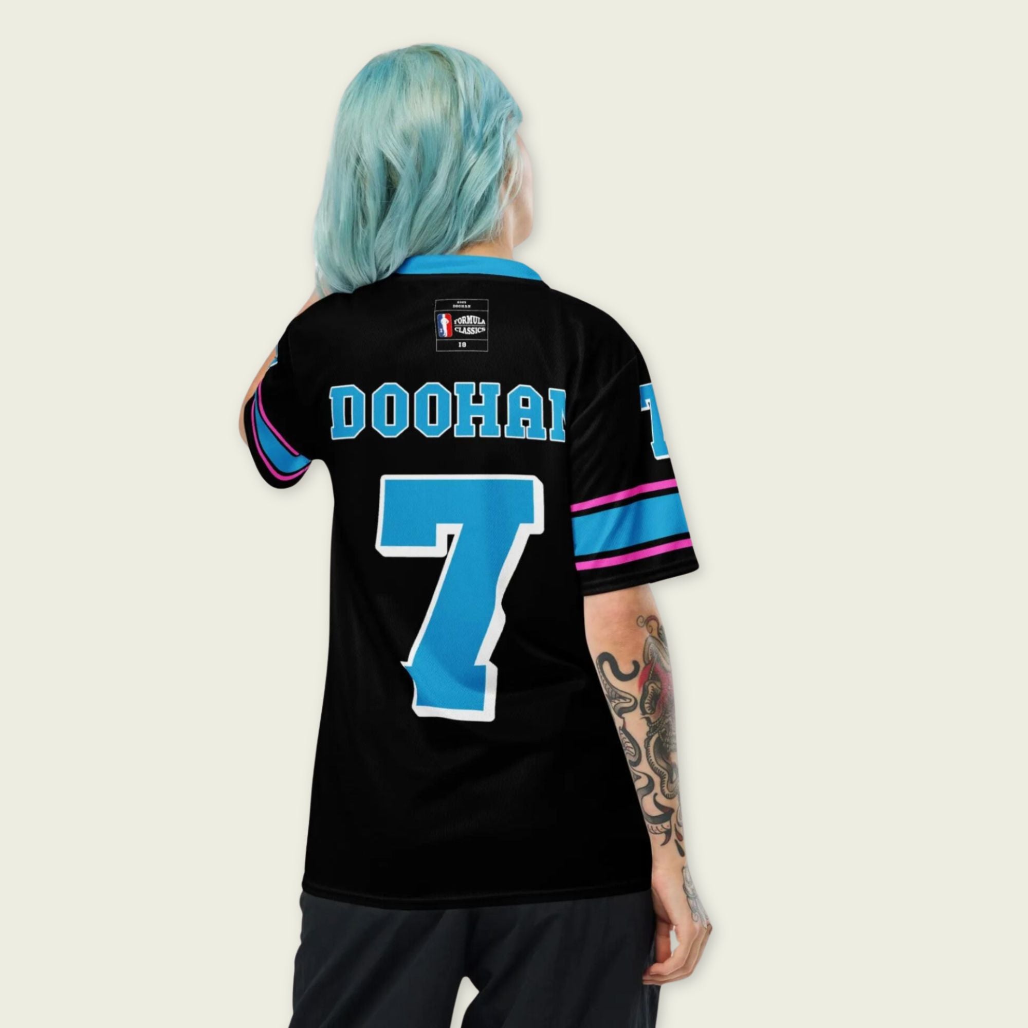 A navy blue football jersey with Jack Doohan's Alpine F1 Racing number 7 on the front and back.