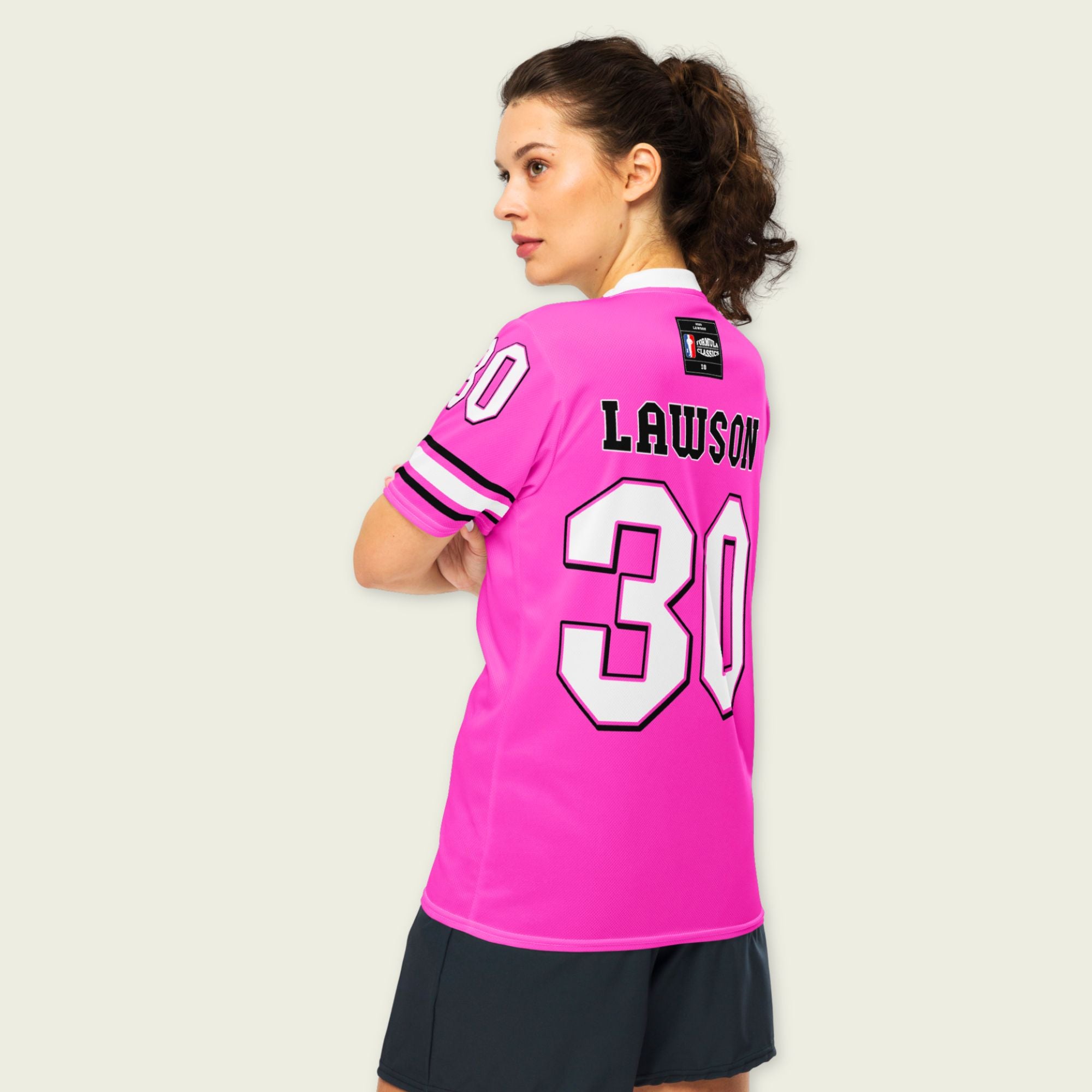 Person wearing a pink sports jersey with the name 'Lawson' and number '30' on a plain background