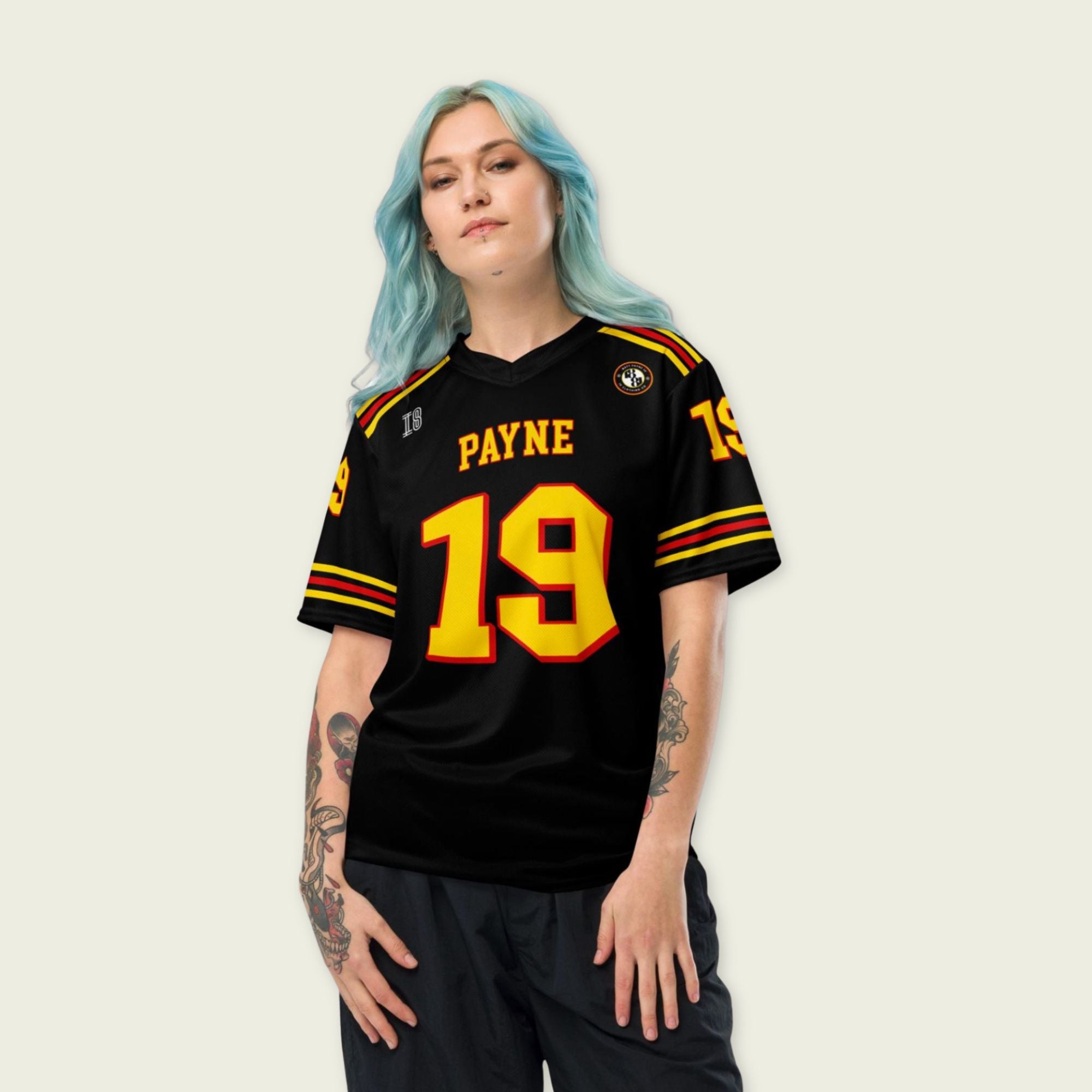 Person wearing a black sports jersey with yellow and red details, featuring the name 'Payne' and number '19'.