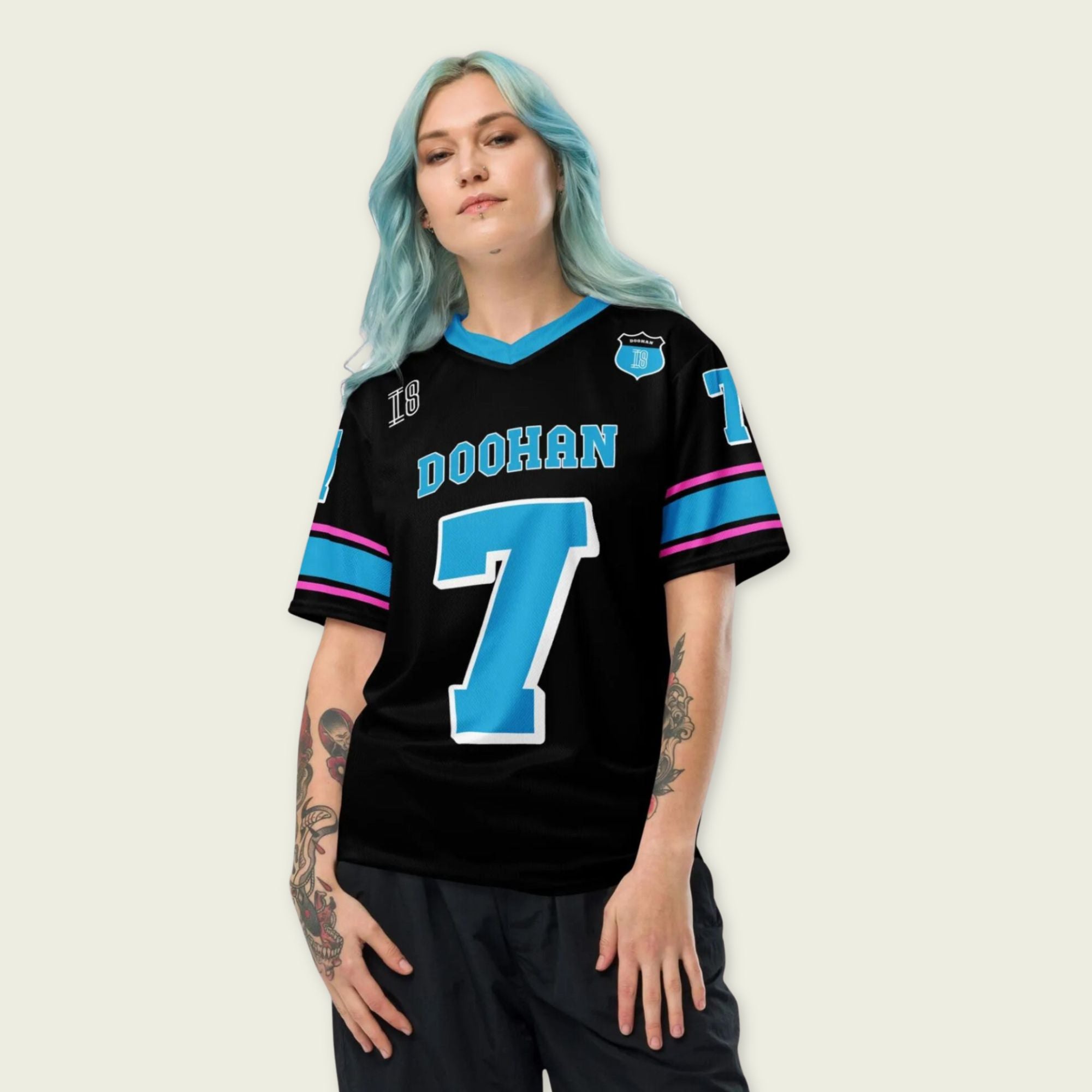 A navy blue football jersey with Jack Doohan's Alpine F1 Racing number 7 on the front and back.