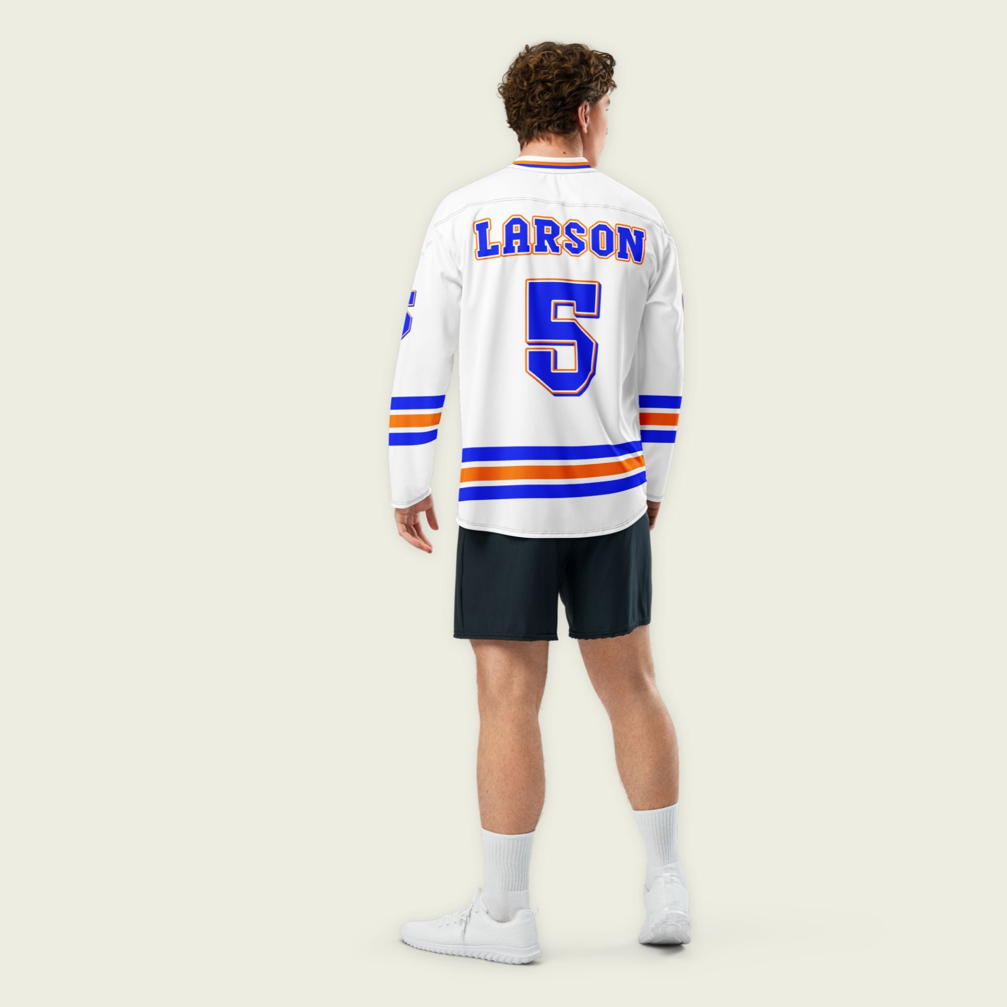 A white hockey jersey with Kyle Larson's nascar racing number 5 in blue with a orange outline. The name larson is also on the front and back.