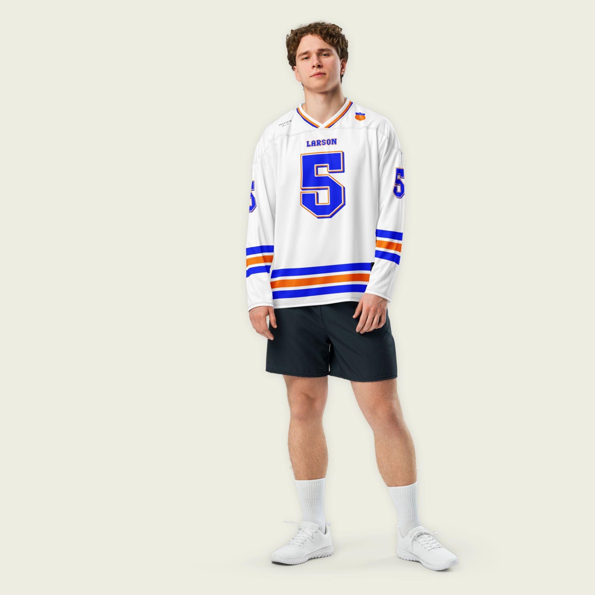 A white hockey jersey with Kyle Larson's nascar racing number 5 in blue with a orange outline. The name larson is also on the front and back.