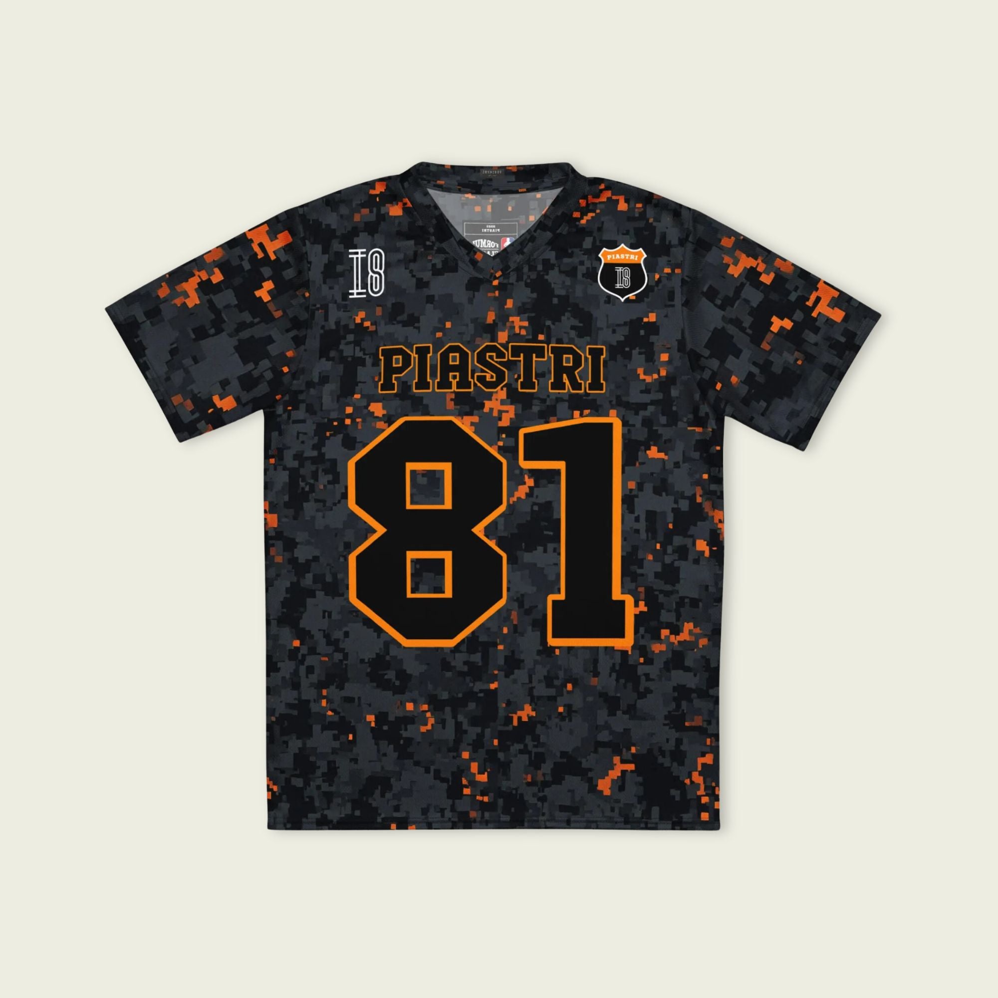 A camoflauge papaya orange football jersey with LOscar Piastri's McLaren F1 Racing number 81 on the front and back.