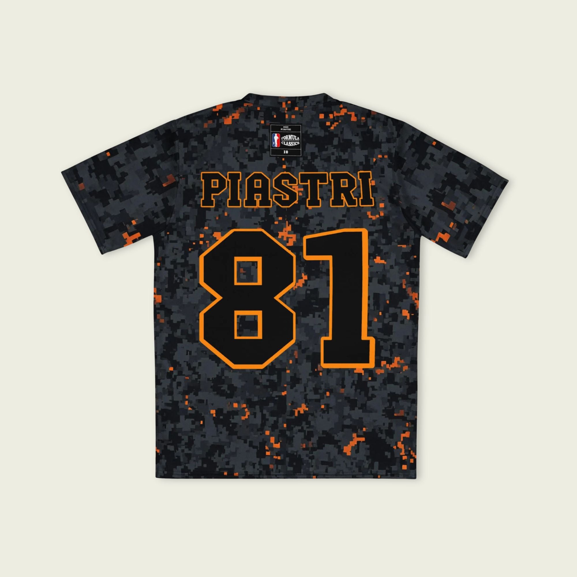 A camoflauge papaya orange football jersey with LOscar Piastri's McLaren F1 Racing number 81 on the front and back.