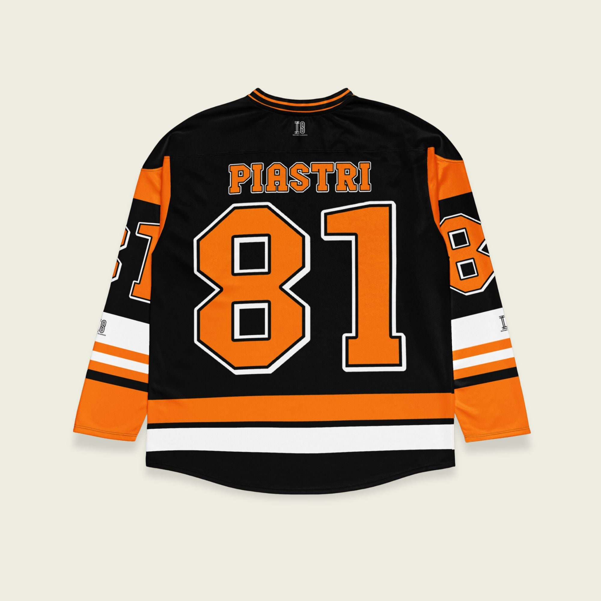 A black hockey jersey with Osacr Piastri's mclaren F1 racing number 81 on the front and back in papaya orange, also the name norris is on the back and front in orange